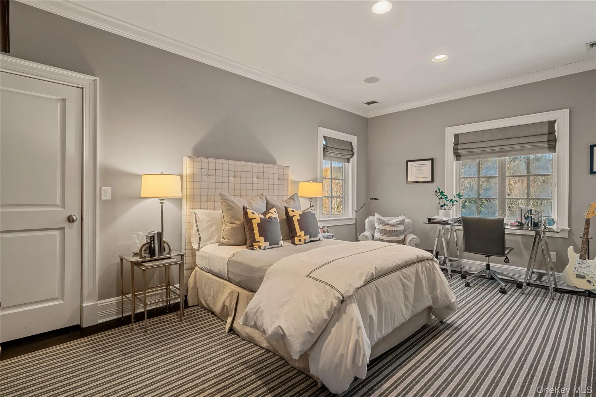 Bedroom featuring ornamental molding, recessed lighting, and a desk Bedroom featuring ornamental molding, recessed lighting, and a desk