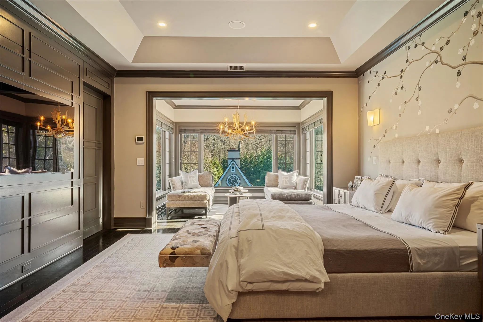 Bedroom with a chandelier, dark wood-style flooring, access to exterior, and ornamental molding Bedroom with a chandelier, dark wood-style flooring, access to exterior, and ornamental molding