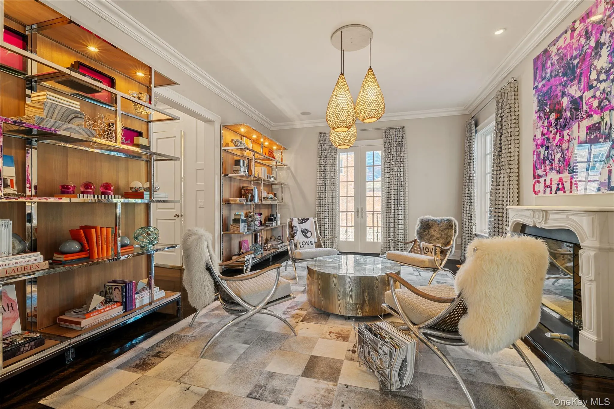 Sitting room with a fireplace, a chandelier, crown molding, and recessed lighting Sitting room with a fireplace, a chandelier, crown molding, and recessed lighting