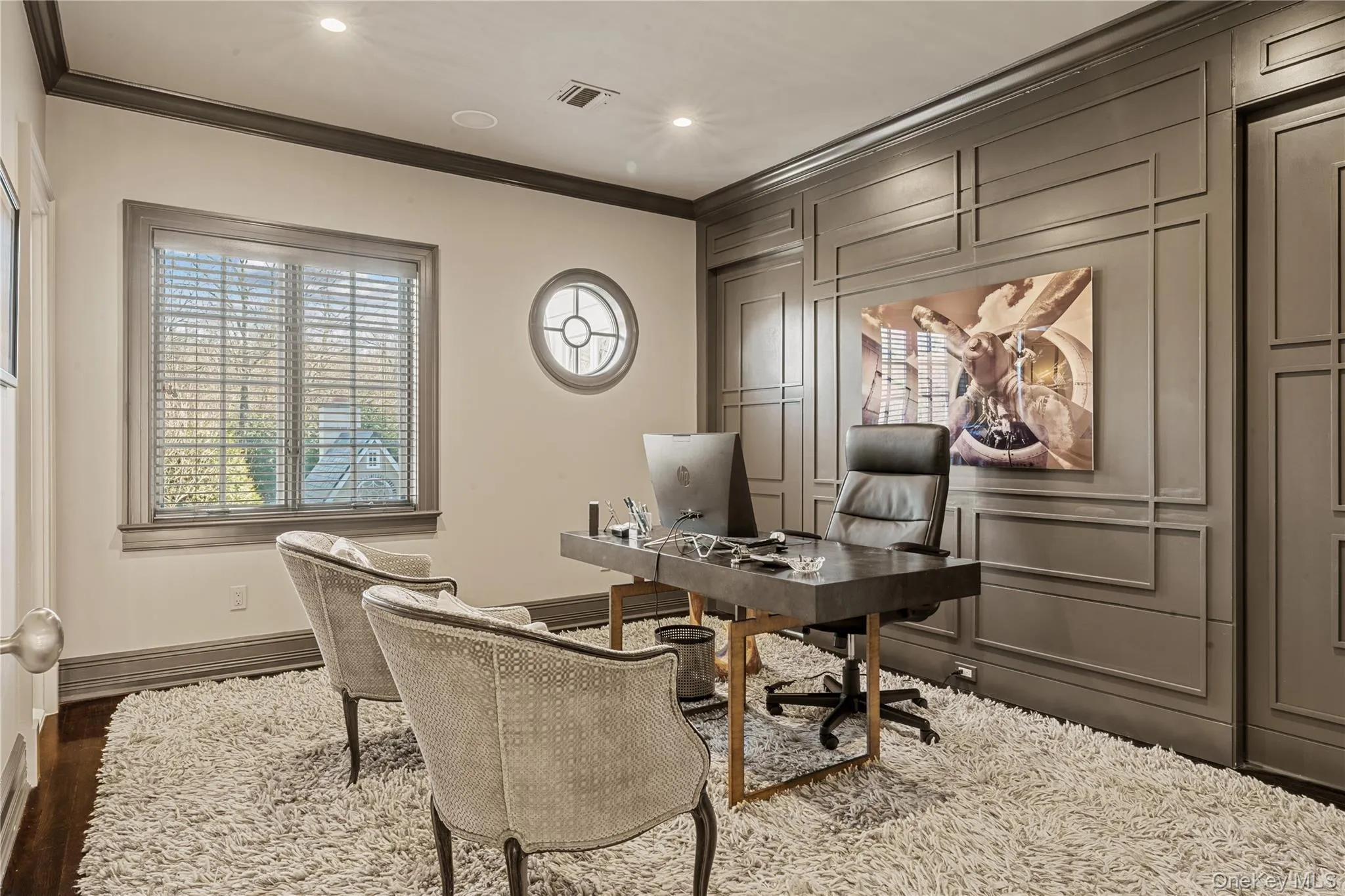 Home office featuring crown molding, recessed lighting, and dark wood finished floors Home office featuring crown molding, recessed lighting, and dark wood finished floors
