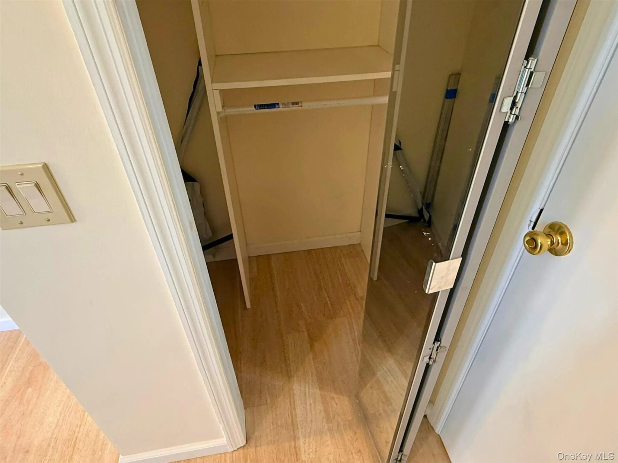 Hallway with light wood-style flooring Hallway with light wood-style flooring