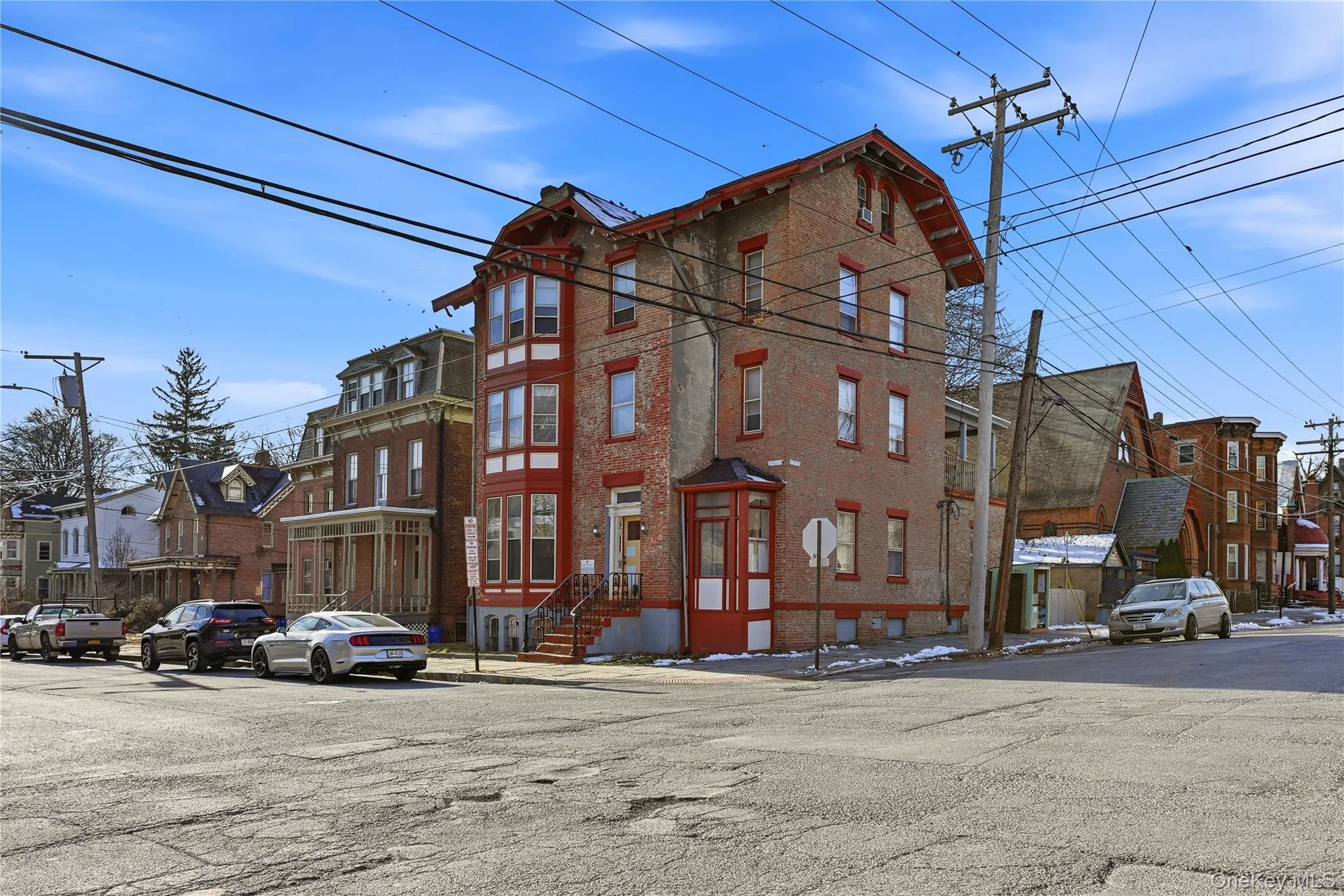 View of building exterior featuring a residential view View of building exterior featuring a residential view