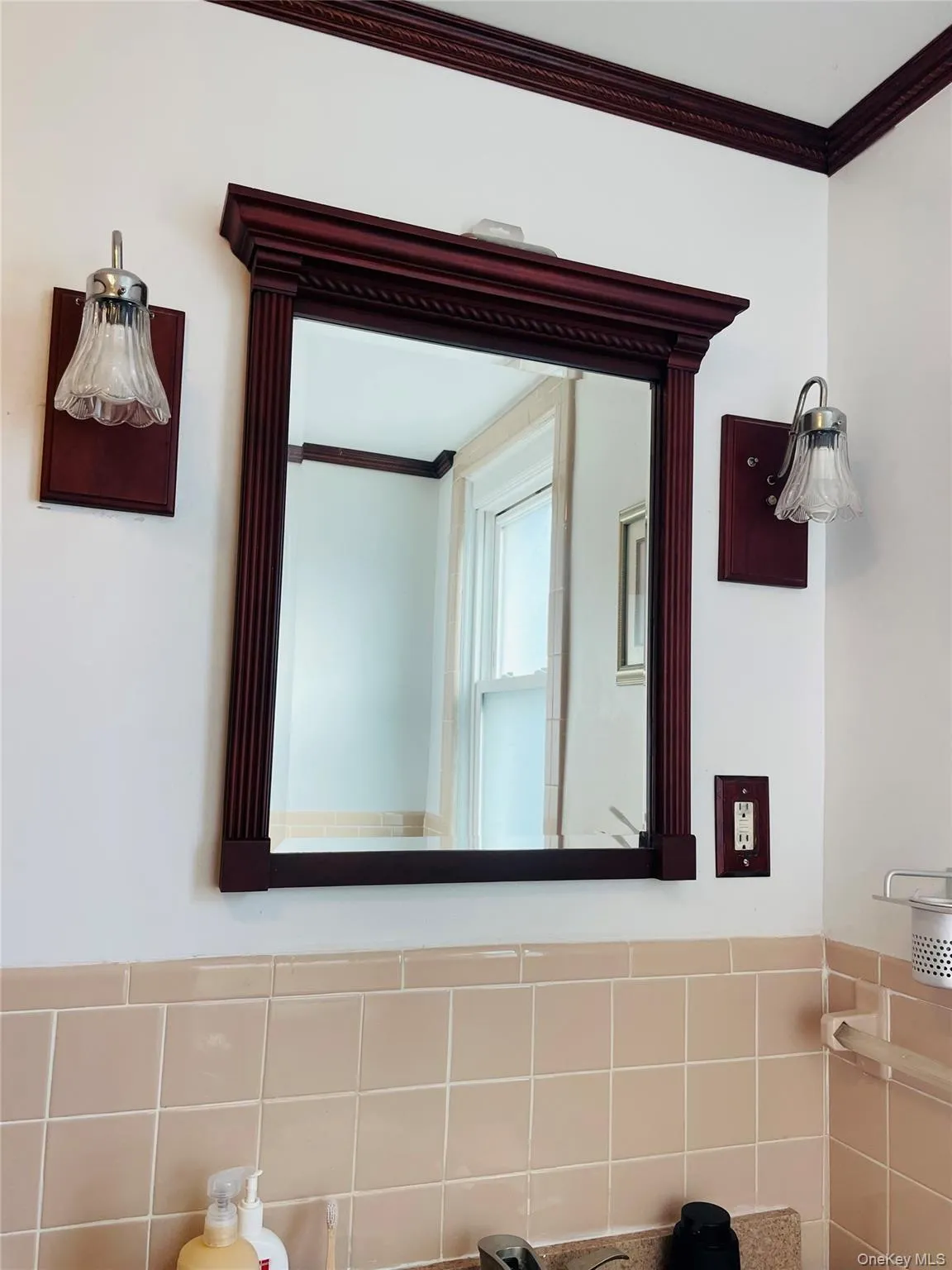 Detailed view of ornamental molding and tile walls Detailed view of ornamental molding and tile walls