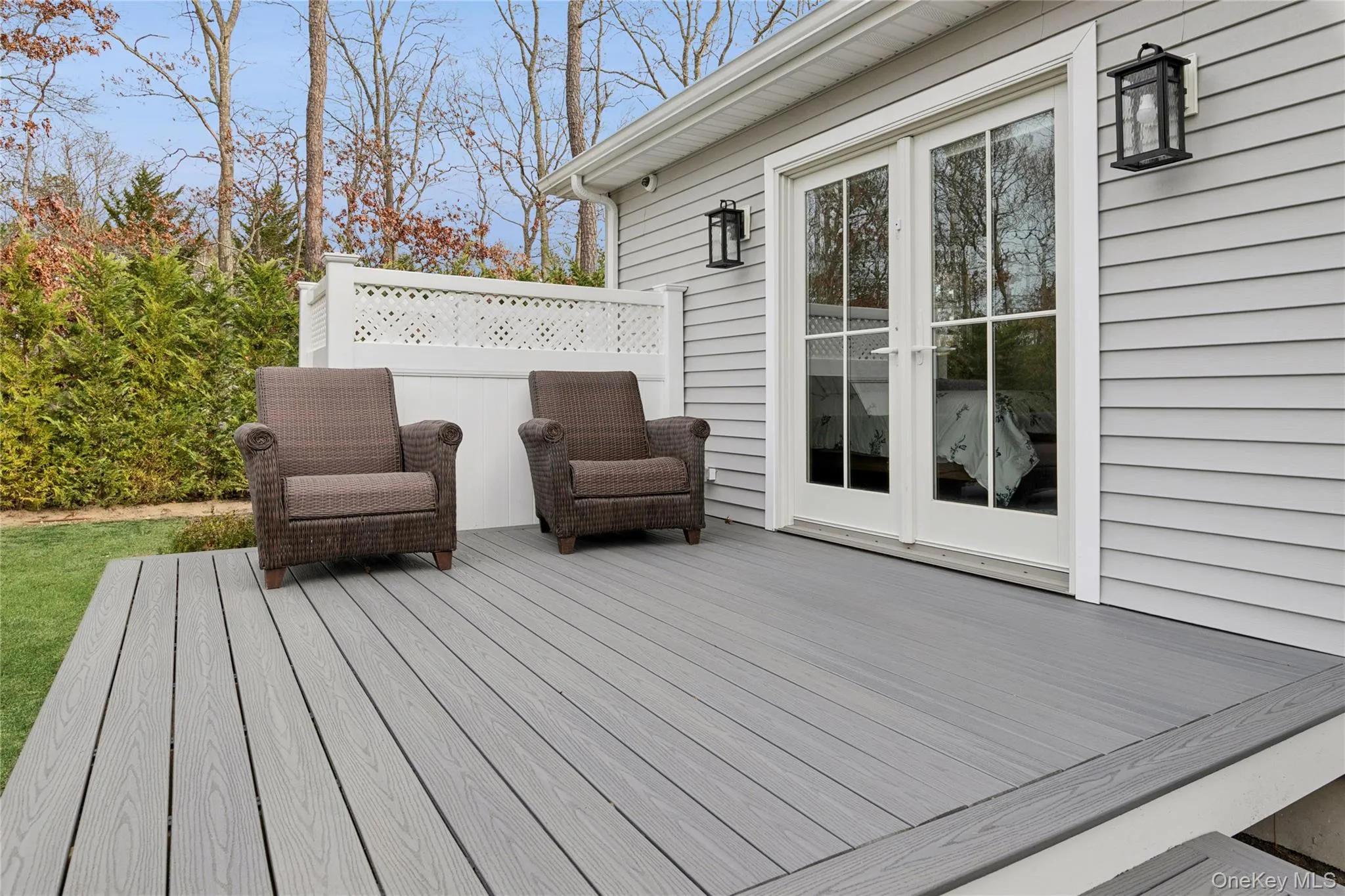 Primary Ensuite Deck Featuring French Doors Primary Ensuite Deck Featuring French Doors