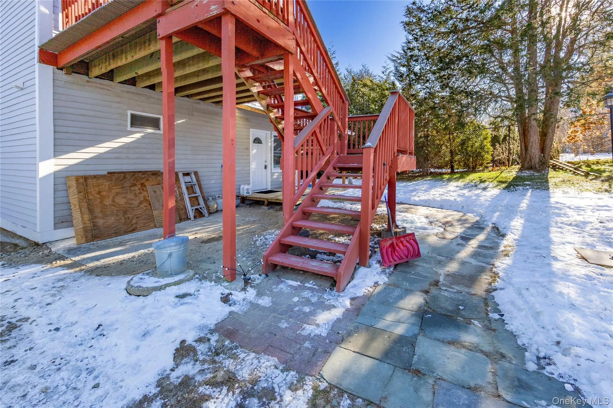 Pathway on the right leads to the first floor entrance. Pathway on the right leads to the first floor entrance.