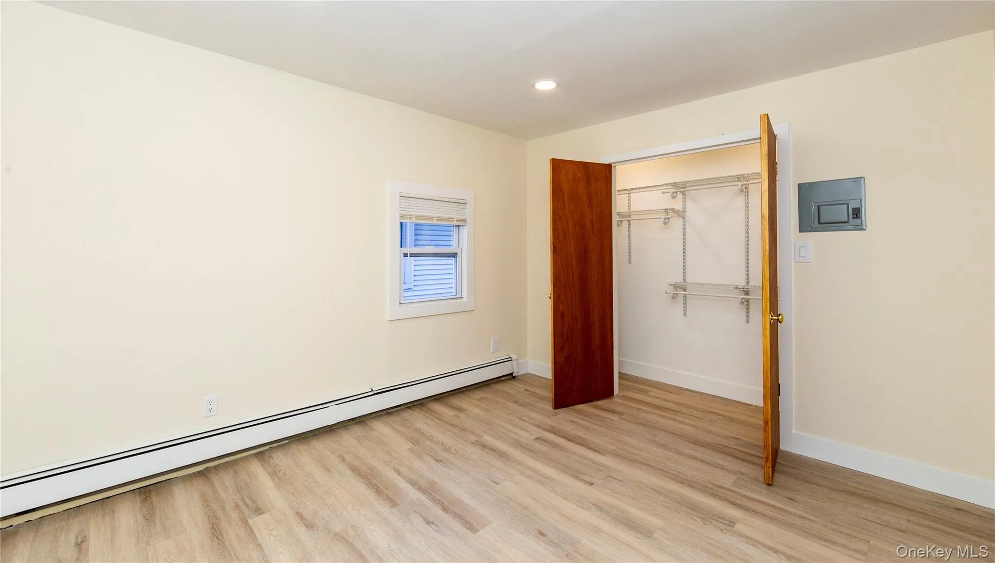 The bedroom features a double door closet. The bedroom features a double door closet.