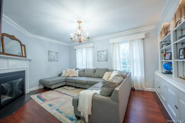 Family room/ Library with 3rd fireplace and bulit-ins Family room/ Library with 3rd fireplace and bulit-ins