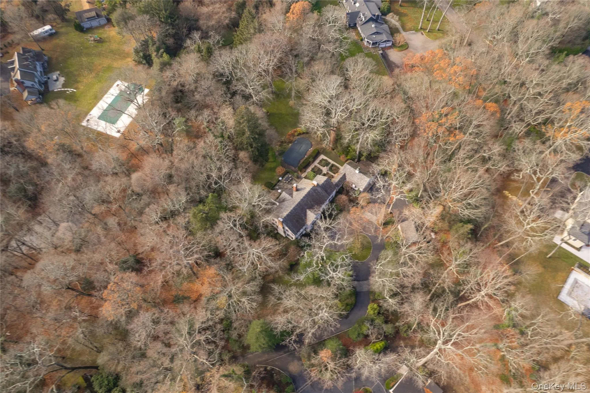 Aerial view of this 4.05 acre property with pool and surrounding area Aerial view of this 4.05 acre property with pool and surrounding area