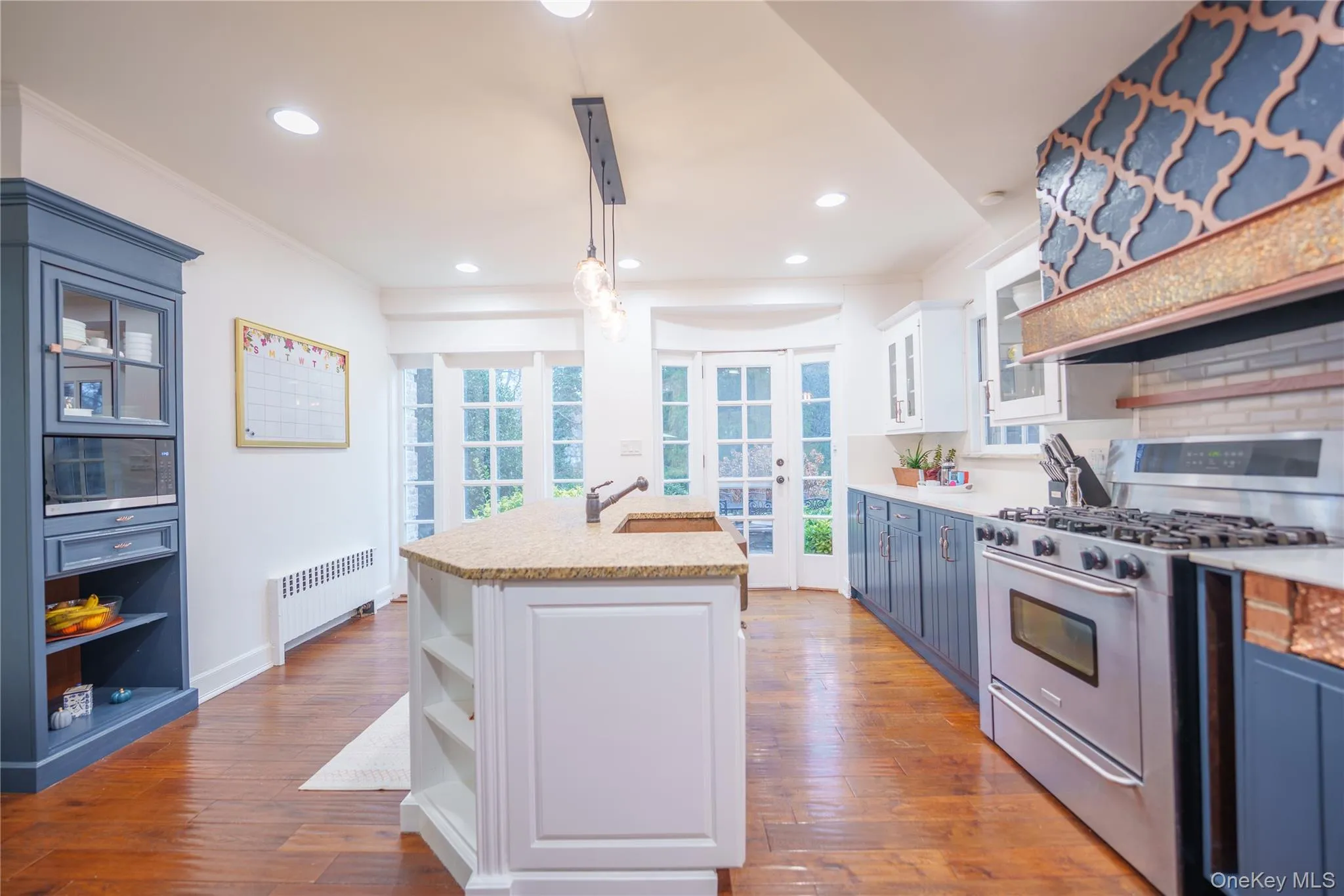 Kitchen featuring doors to bluestone patio Kitchen featuring doors to bluestone patio