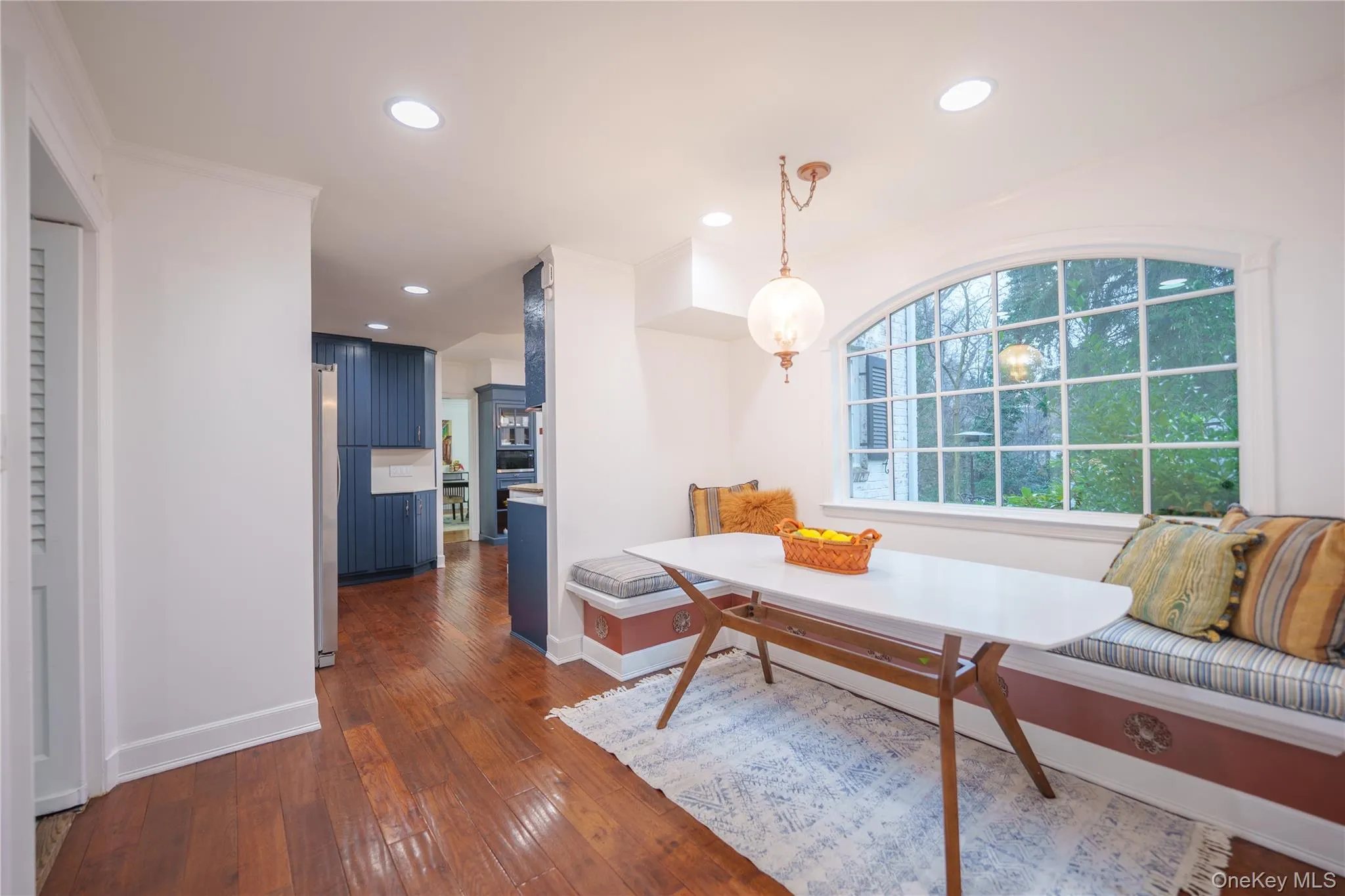 Built in banquet with table and vintage fixture Built in banquet with table and vintage fixture