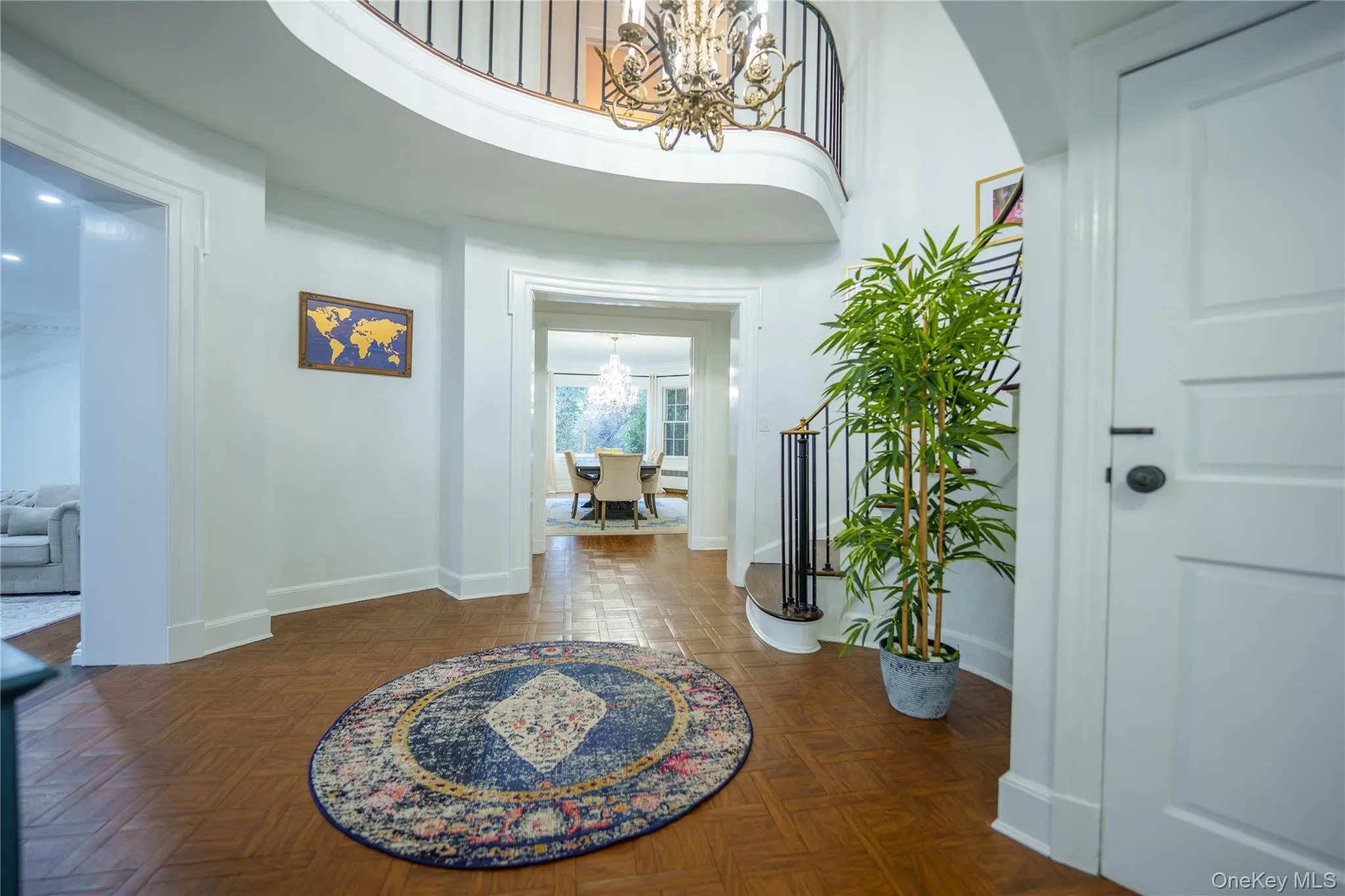Foyer featuring timeless chandelier and cathedral ceiling Foyer featuring timeless chandelier and cathedral ceiling