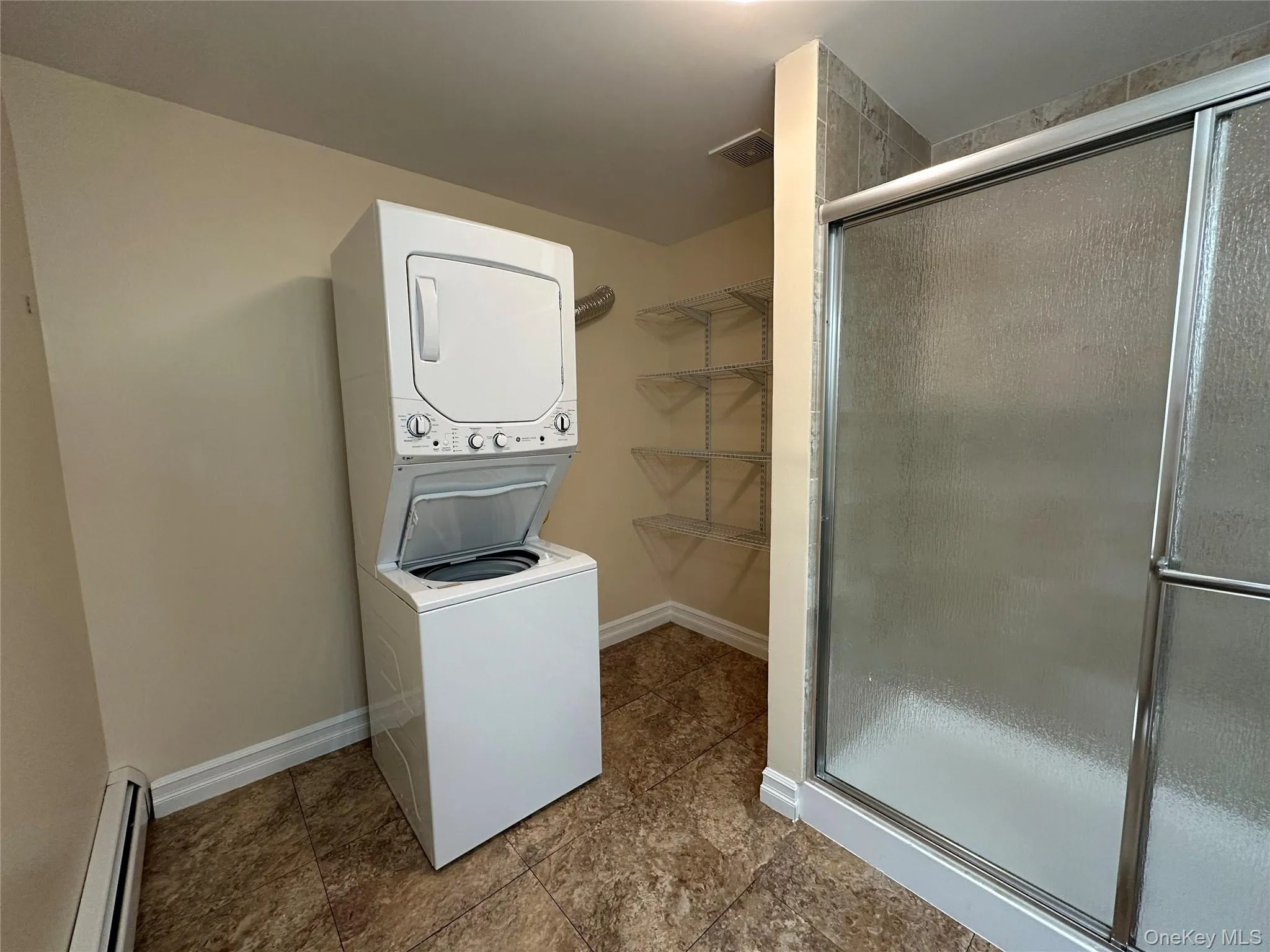 Washer and dryer conveniently located in unit Washer and dryer conveniently located in unit