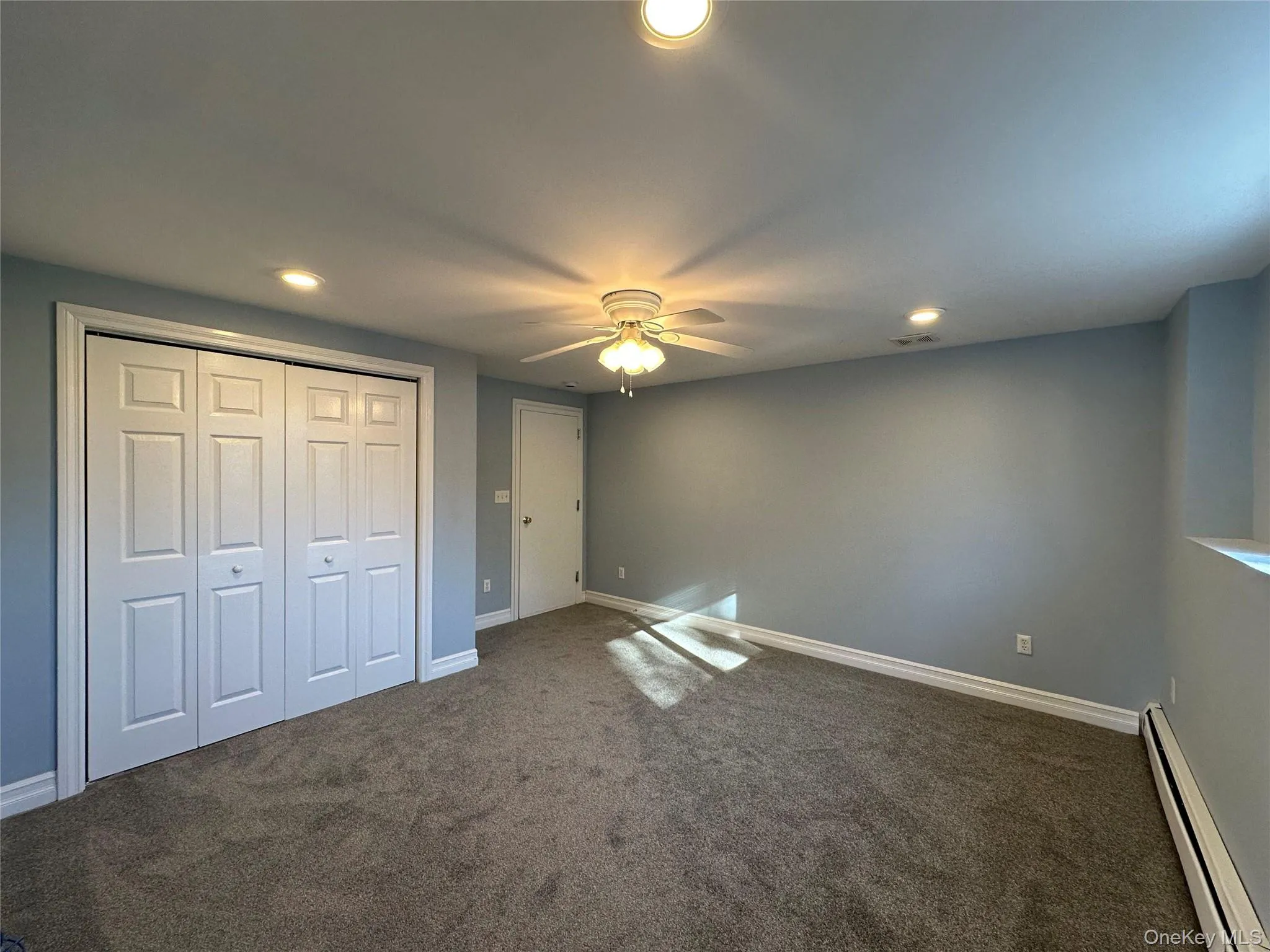 Main bedroom with closet Main bedroom with closet