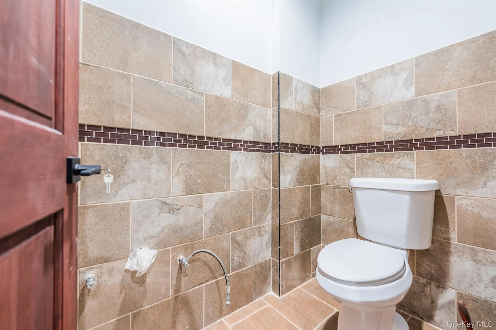 Bathroom featuring toilet Bathroom featuring toilet