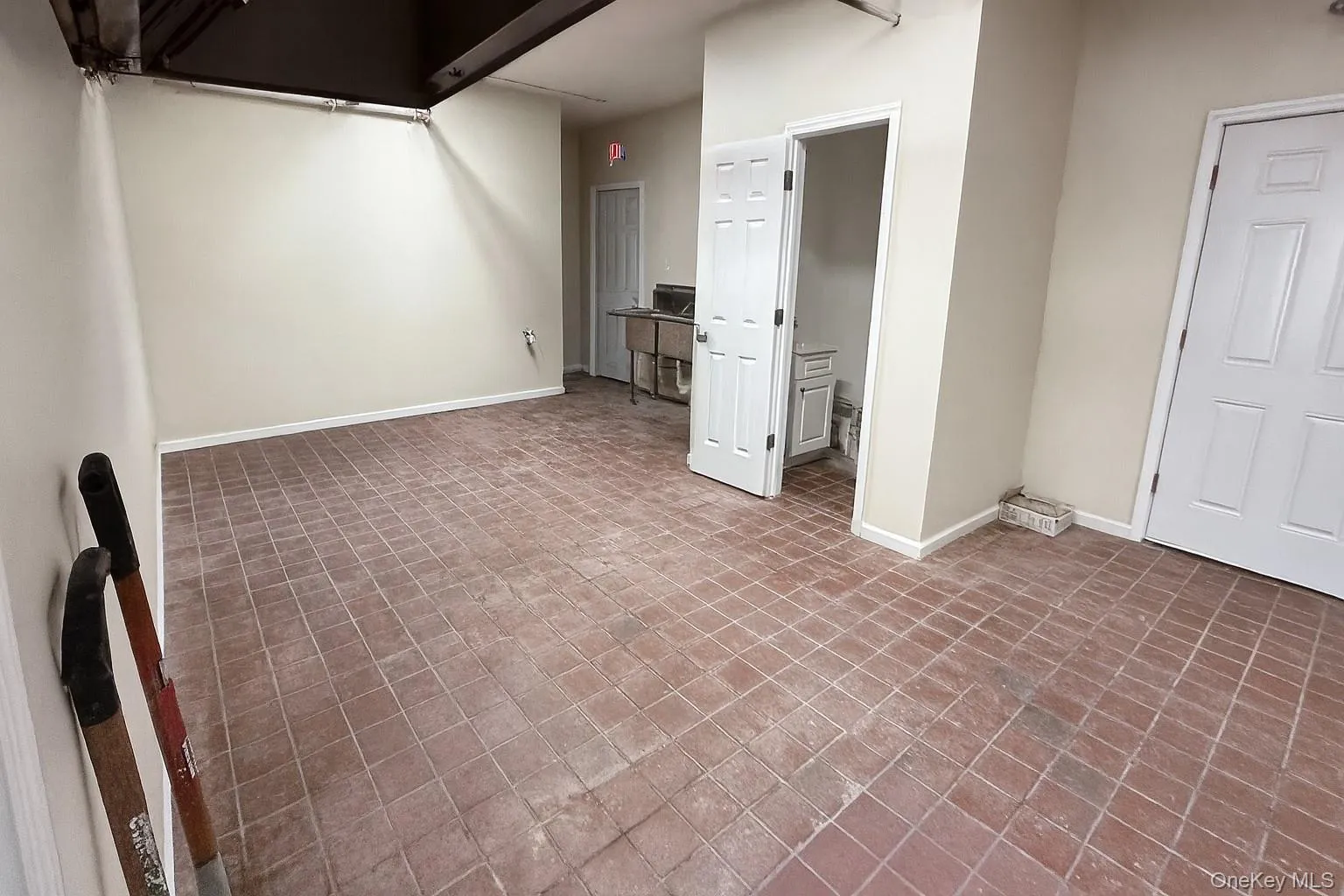 Spare room featuring baseboards Spare room featuring baseboards