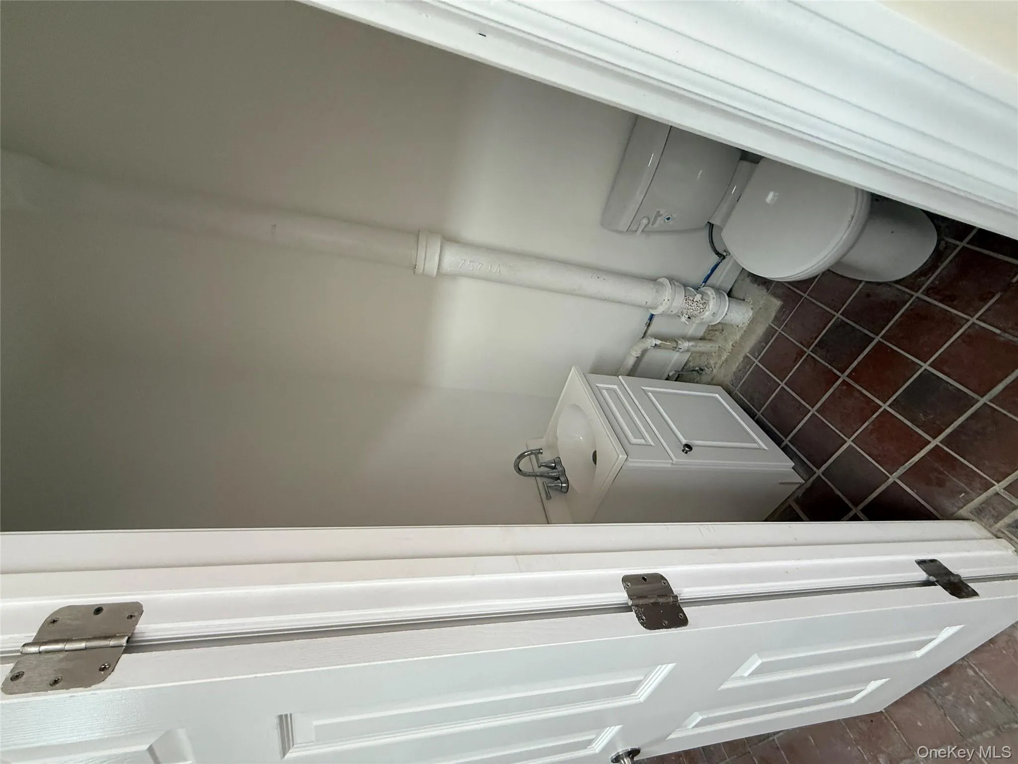 Bathroom featuring vanity and toilet Bathroom featuring vanity and toilet