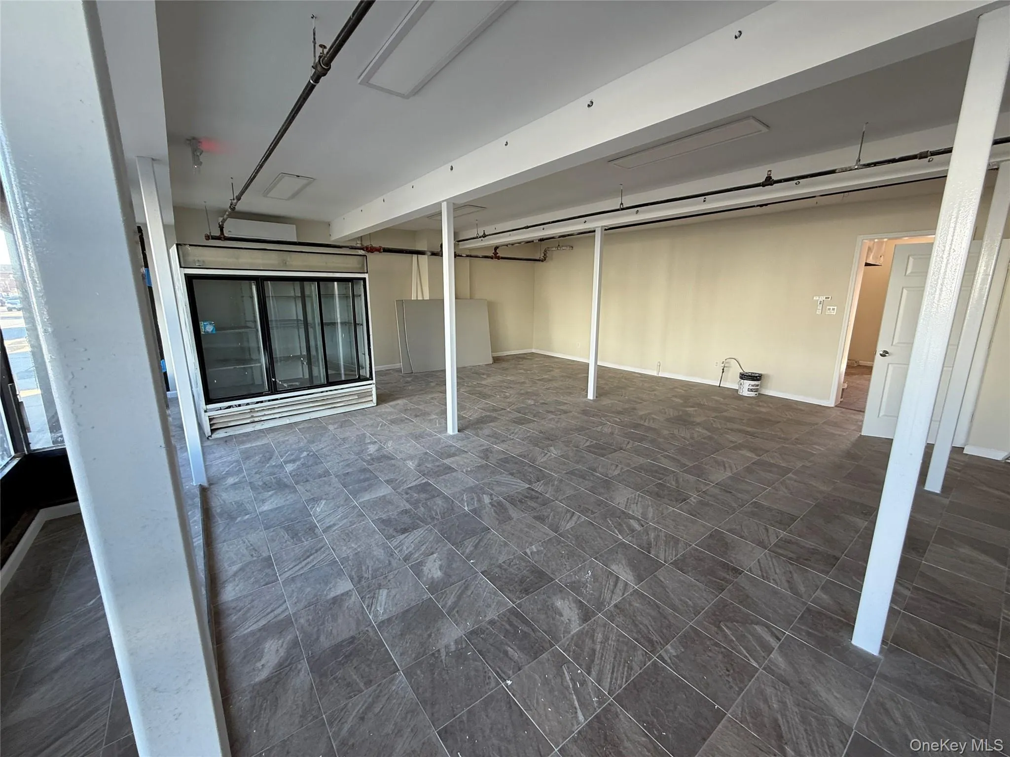 Finished basement featuring baseboards Finished basement featuring baseboards