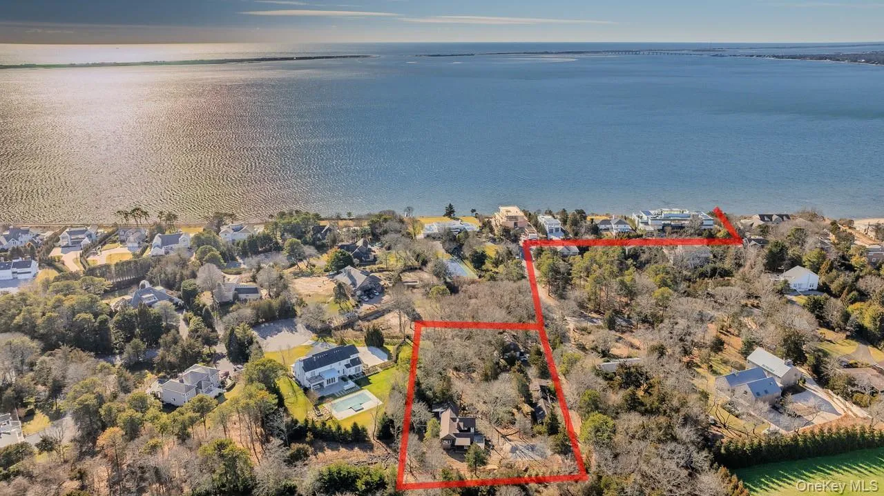 Aerial view of residential area featuring distance to the beach Aerial view of residential area featuring distance to the beach