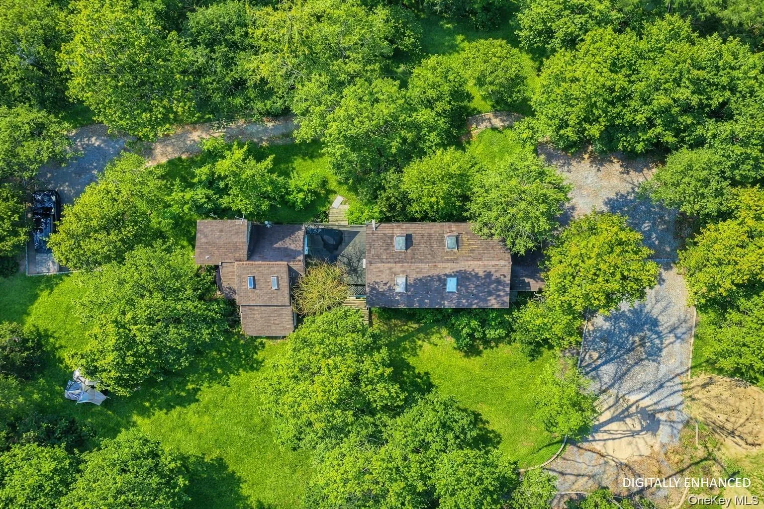 Aerial view of cottage property and surrounding area - Digitally Enhanced Aerial view of cottage property and surrounding area - Digitally Enhanced