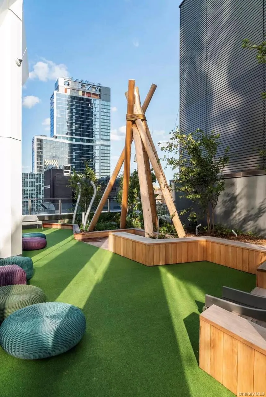 View of jungle gym featuring a city view View of jungle gym featuring a city view