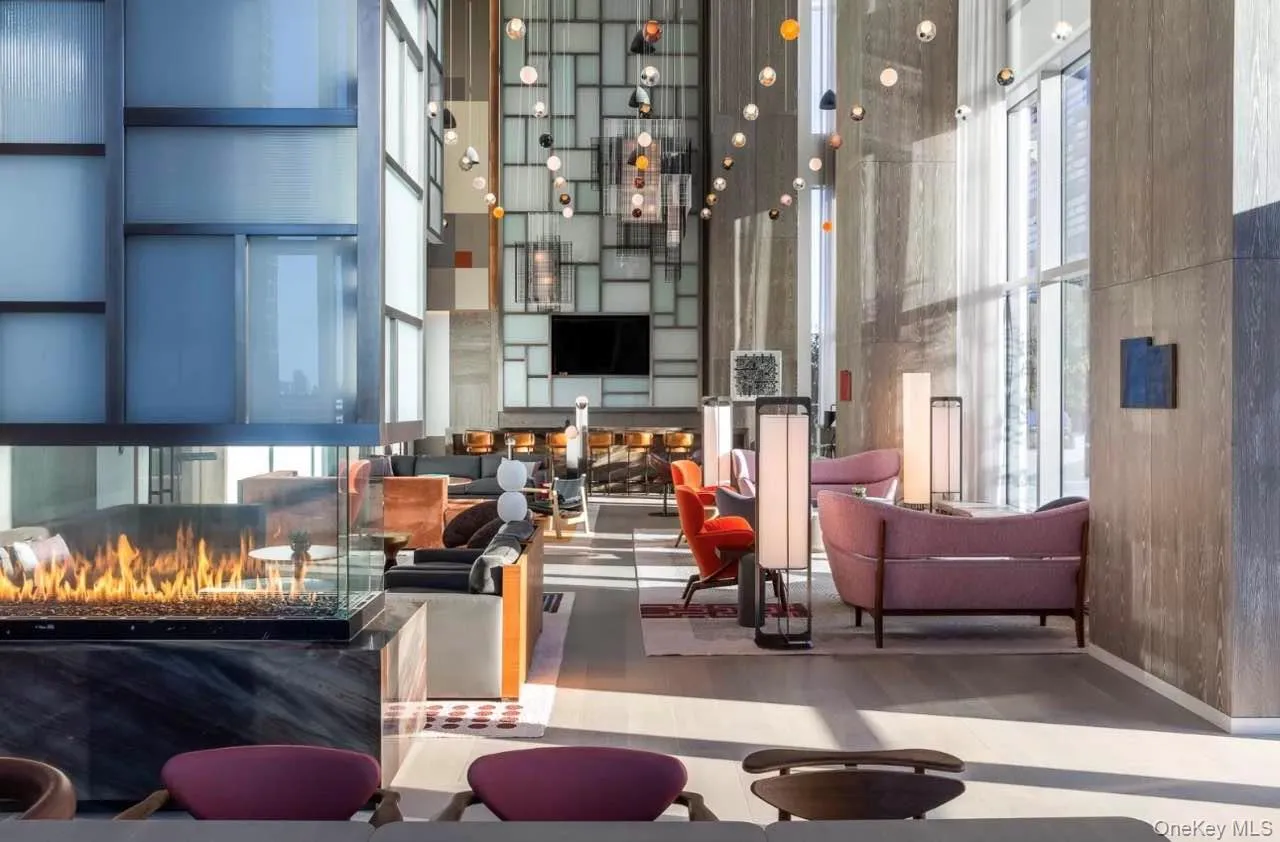 Building lobby featuring a high ceiling Building lobby featuring a high ceiling