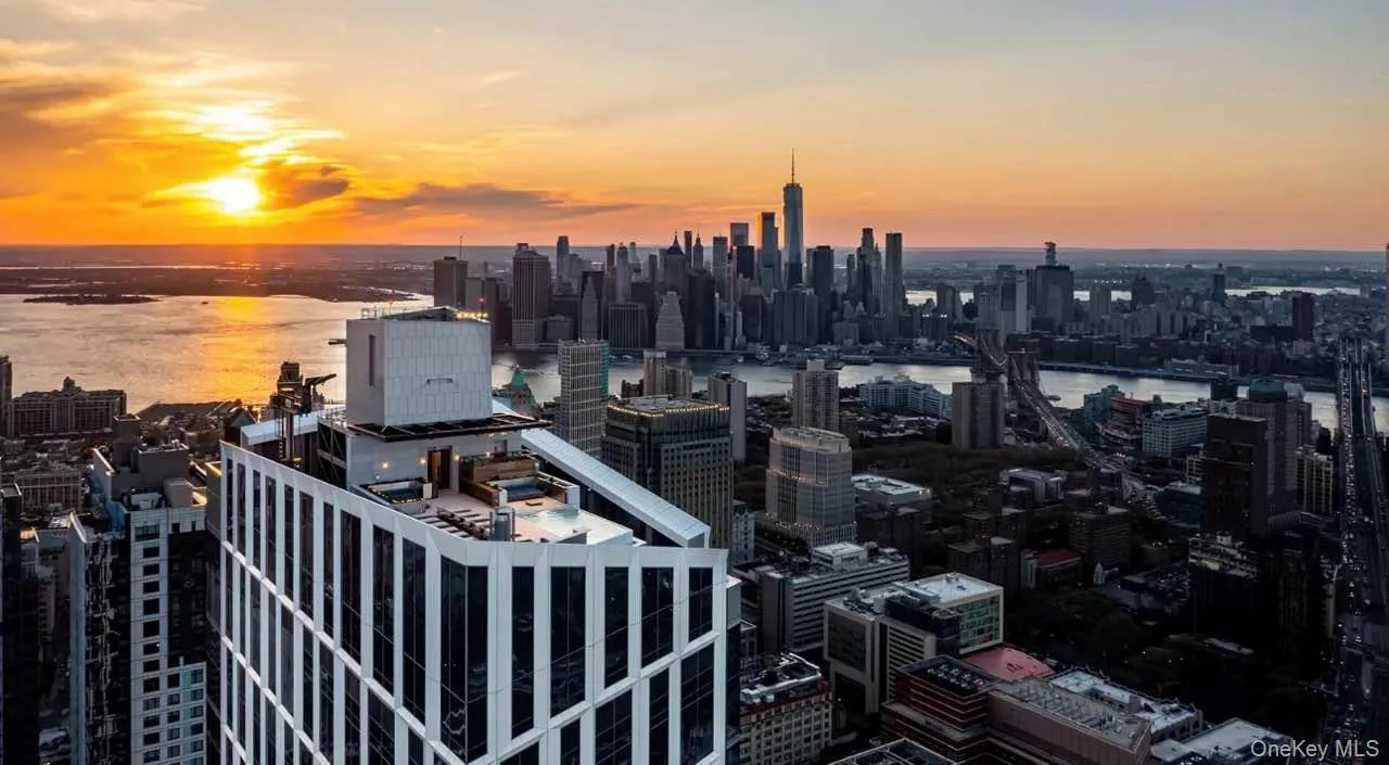 City view with a nearby body of water City view with a nearby body of water