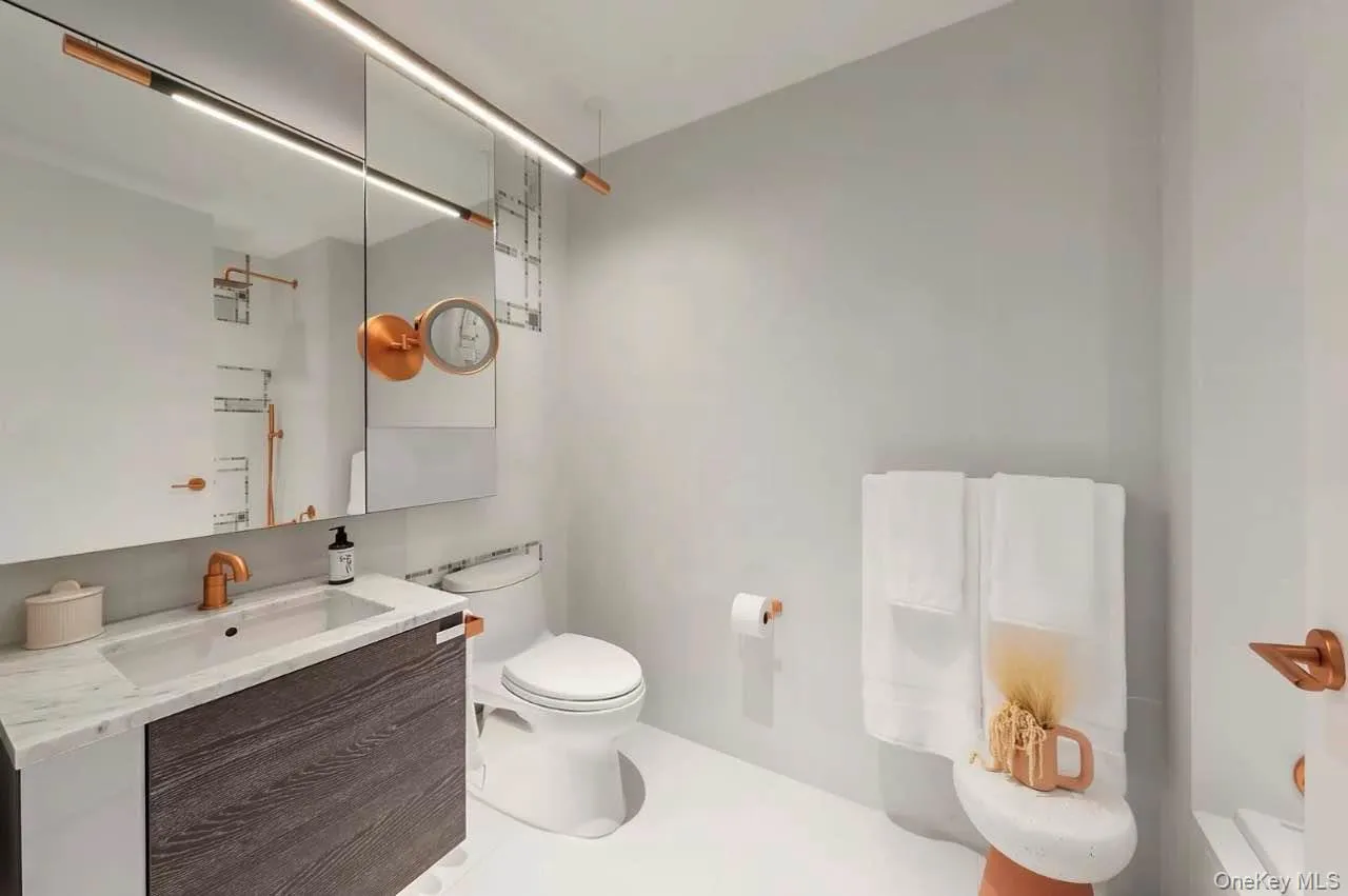 Full bathroom with vanity and toilet Full bathroom with vanity and toilet