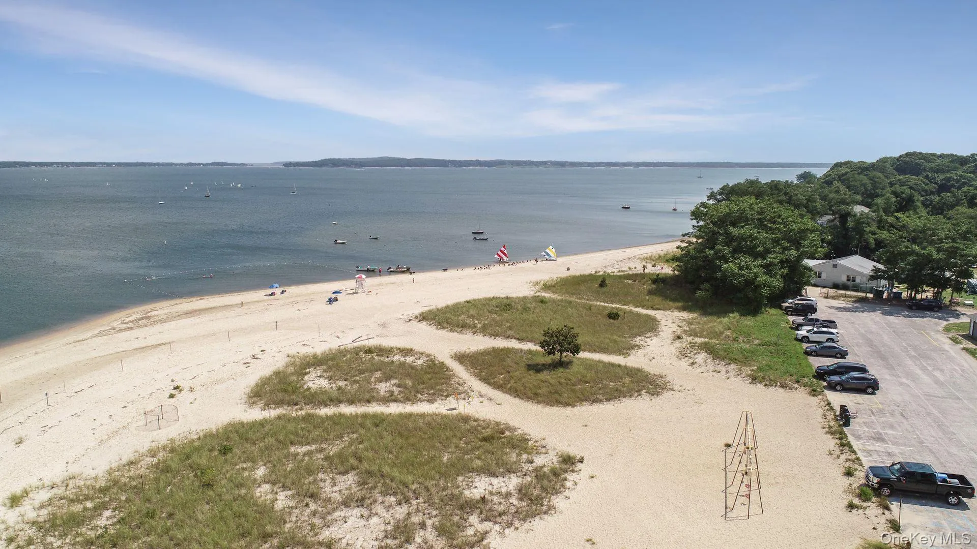 Water view featuring nearby beach Water view featuring nearby beach