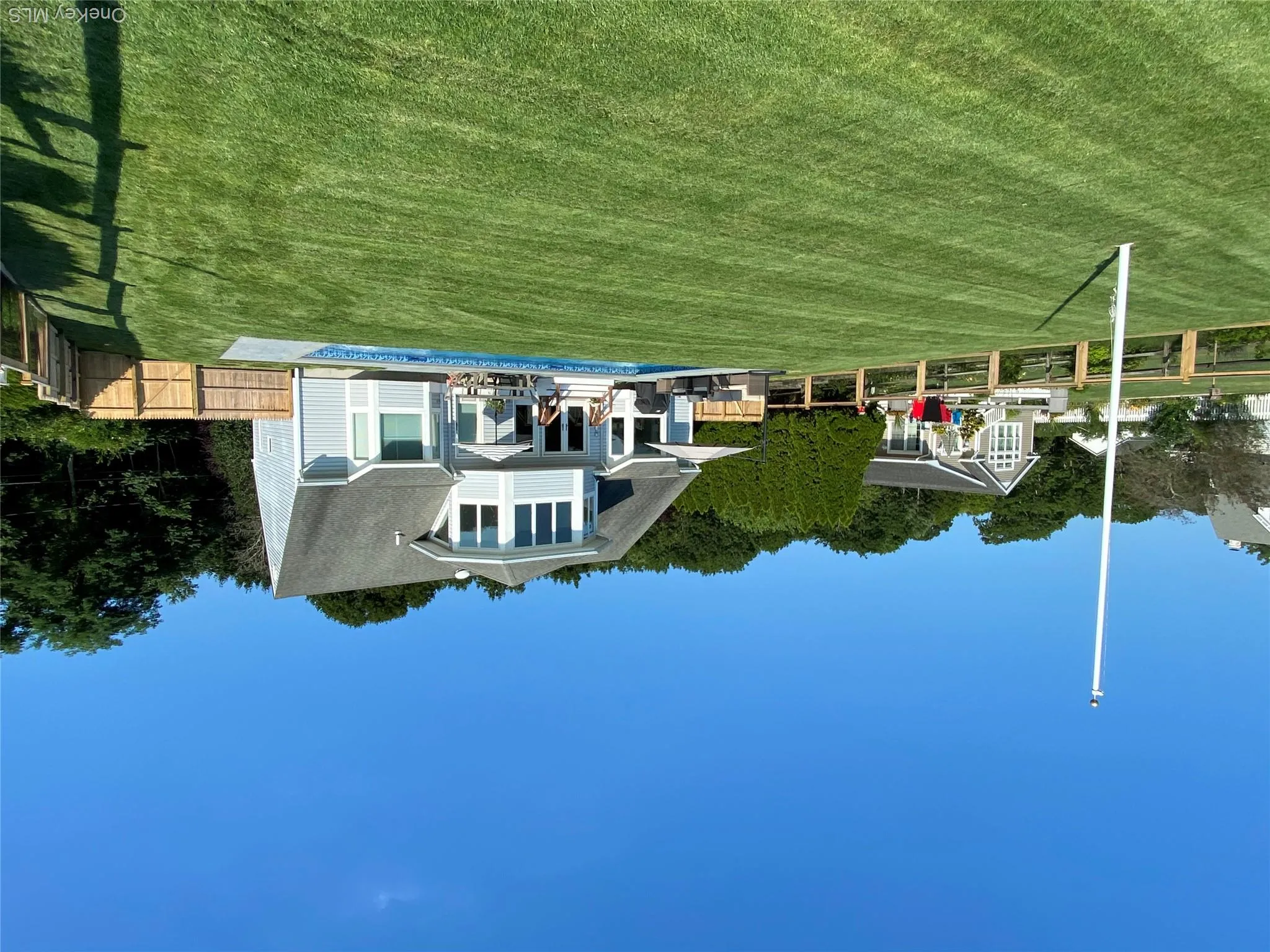 Nicely manicured yard for a game of croquet! Nicely manicured yard for a game of croquet!