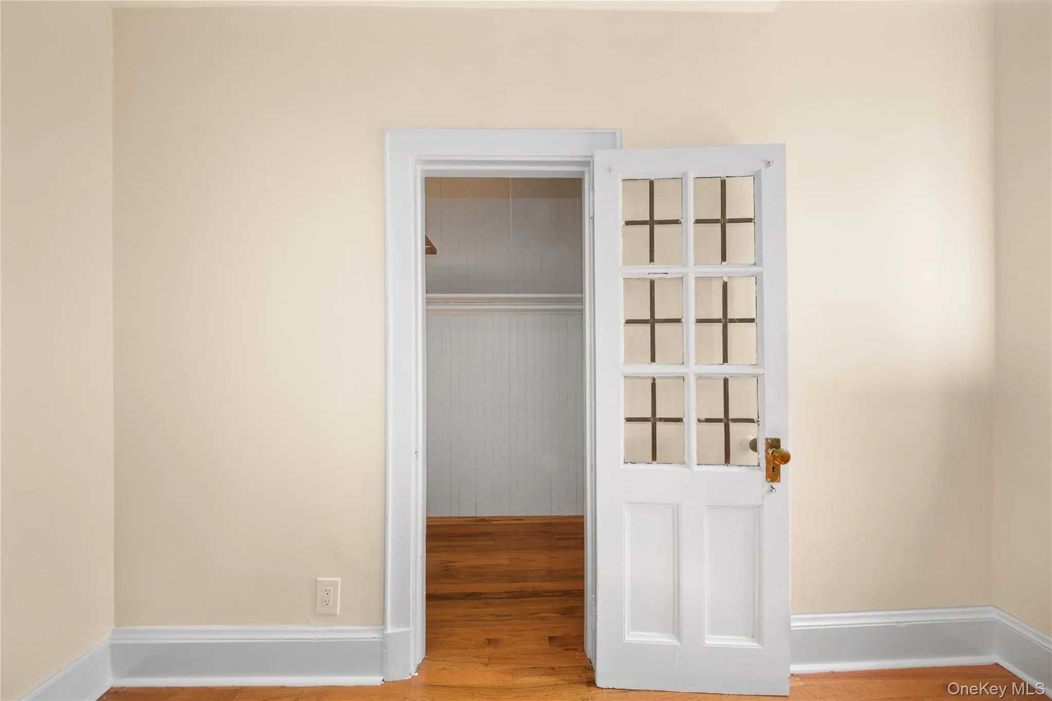 Unfurnished bedroom featuring light wood finished floors and baseboards Unfurnished bedroom featuring light wood finished floors and baseboards