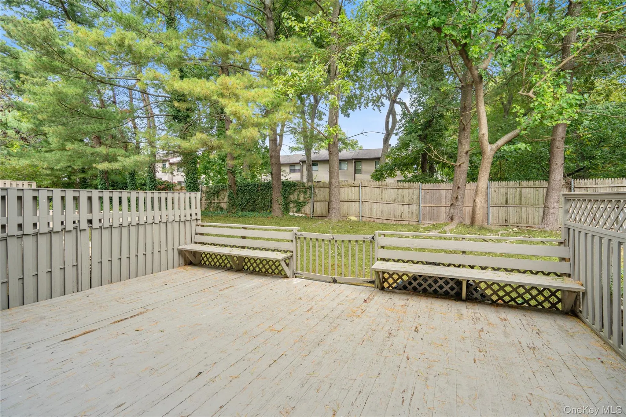 Deck featuring a fenced backyard Deck featuring a fenced backyard