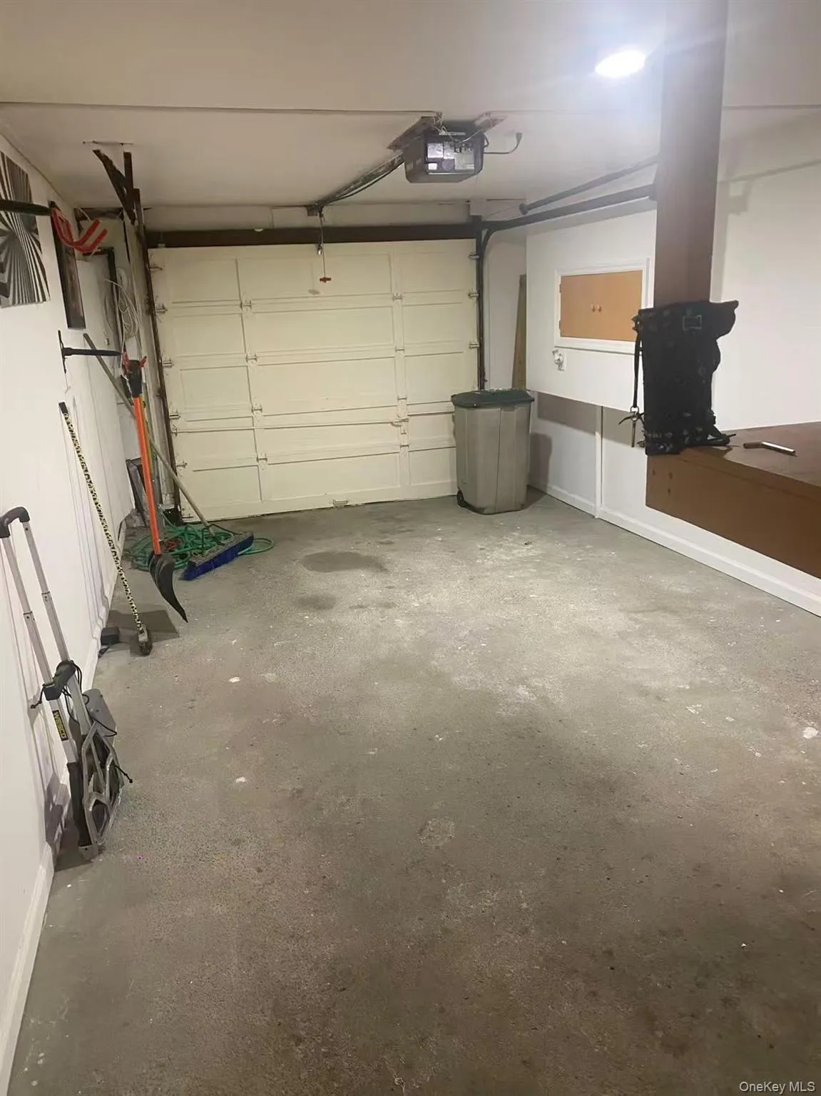 Garage featuring a garage door opener Garage featuring a garage door opener