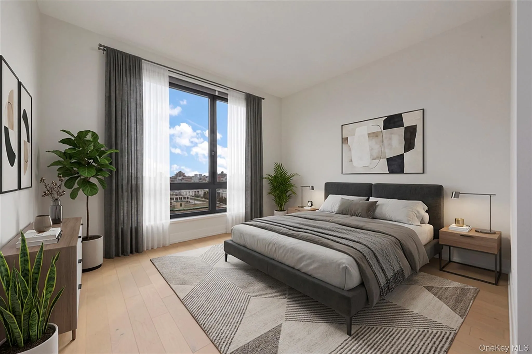 Bedroom featuring light wood-style flooring Bedroom featuring light wood-style flooring