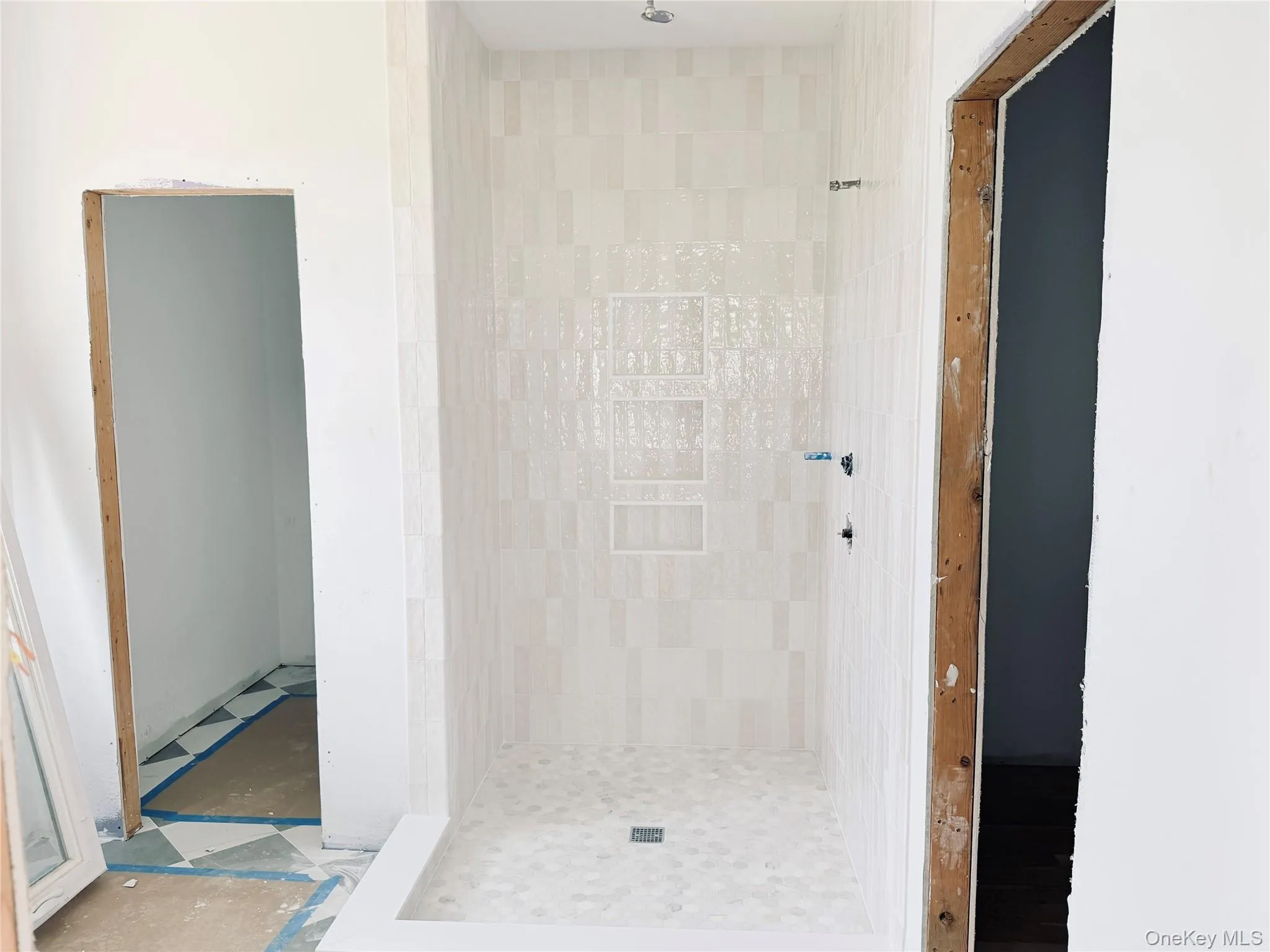....and a gorgeous tiled primary bathroom... ....and a gorgeous tiled primary bathroom...