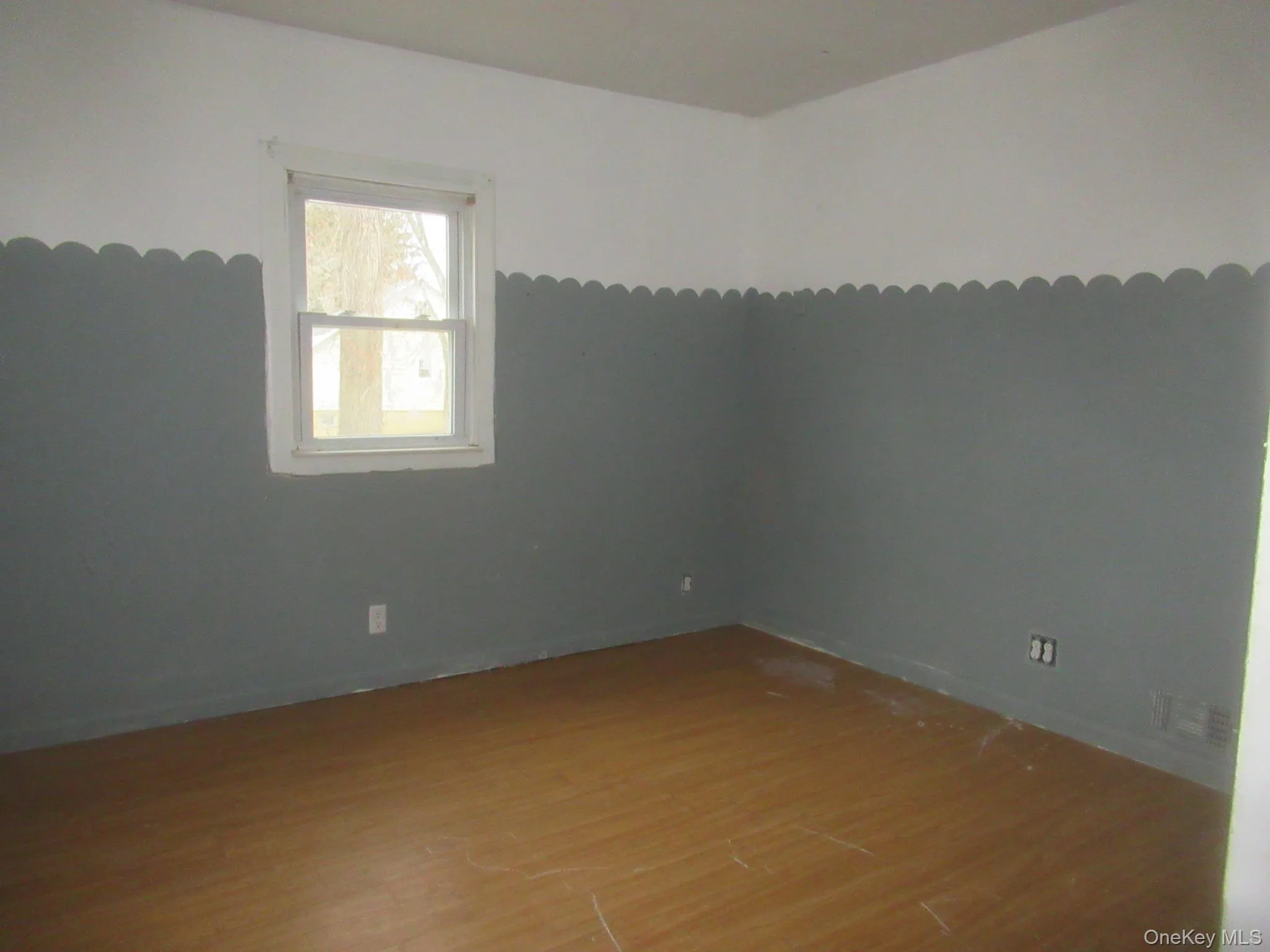 Empty room with wood finished floors Empty room with wood finished floors