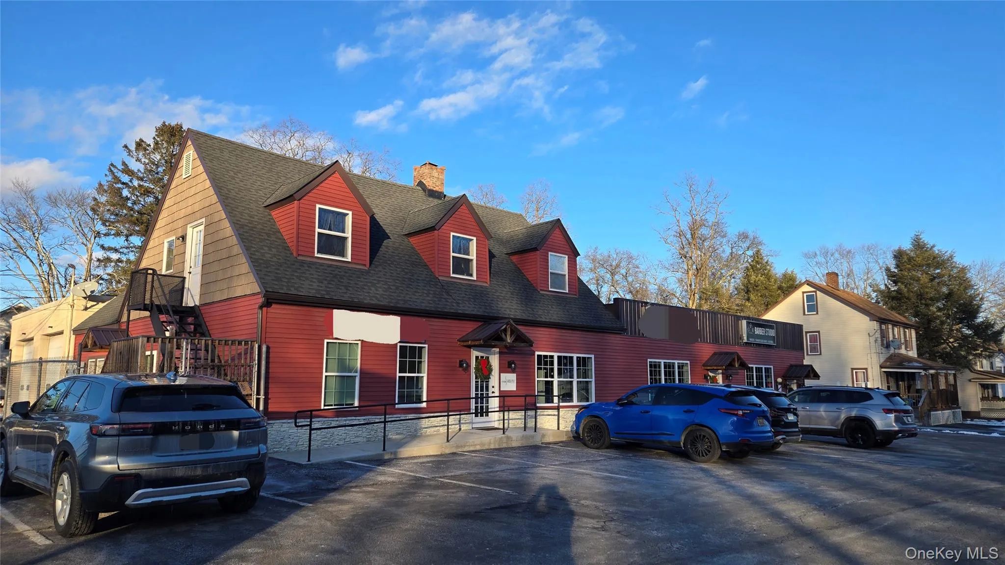 View of front of building with parking. View of front of building with parking.