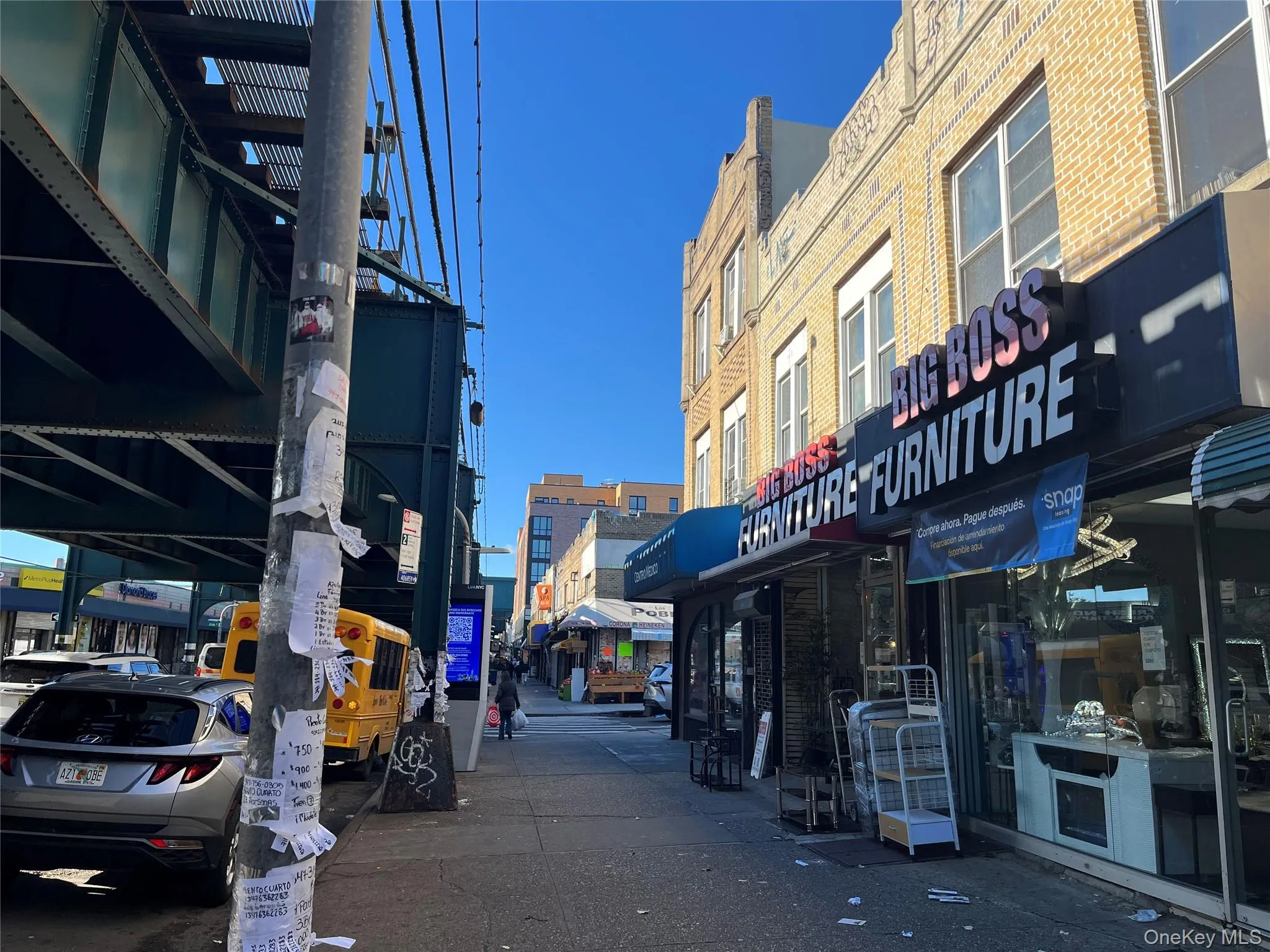 View of asphalt street featuring sidewalks View of asphalt street featuring sidewalks