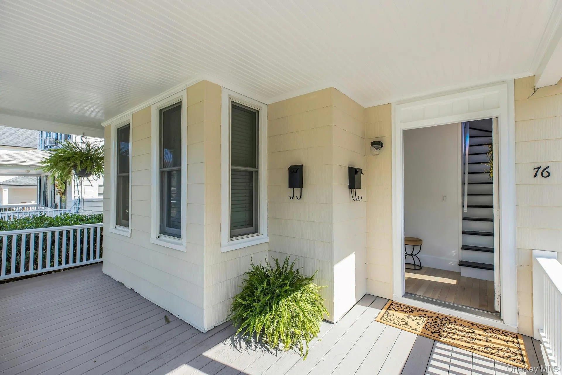 View of exterior entry featuring a porch View of exterior entry featuring a porch
