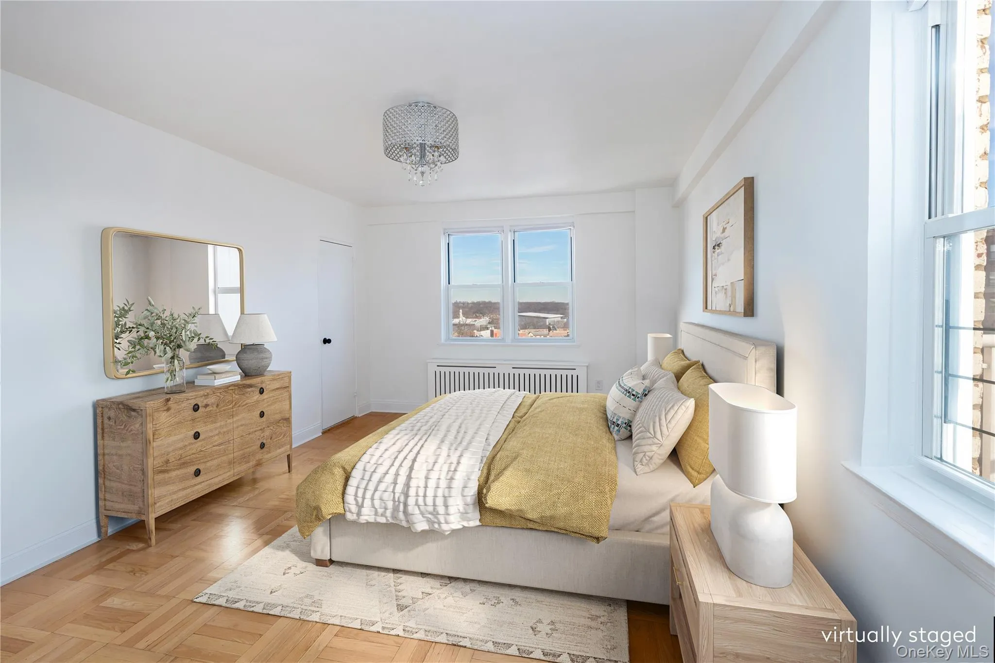 Bedroom with radiator heating unit and a chandelier Bedroom with radiator heating unit and a chandelier