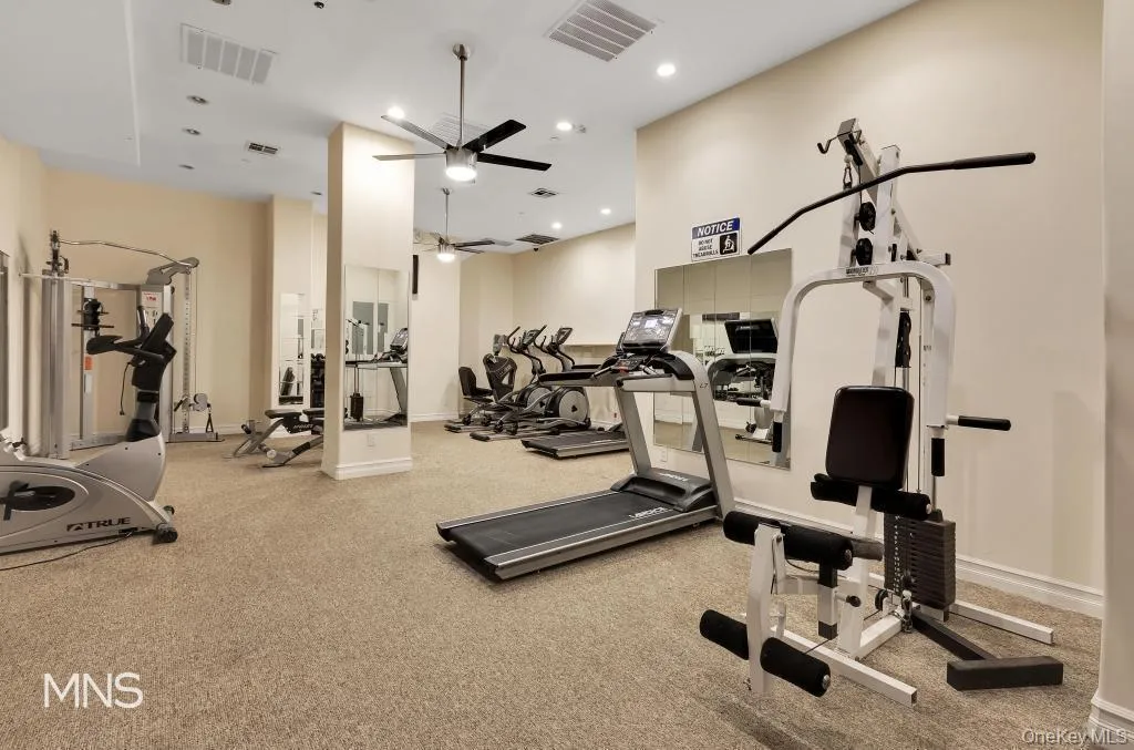 Gym with recessed lighting and ceiling fan Gym with recessed lighting and ceiling fan