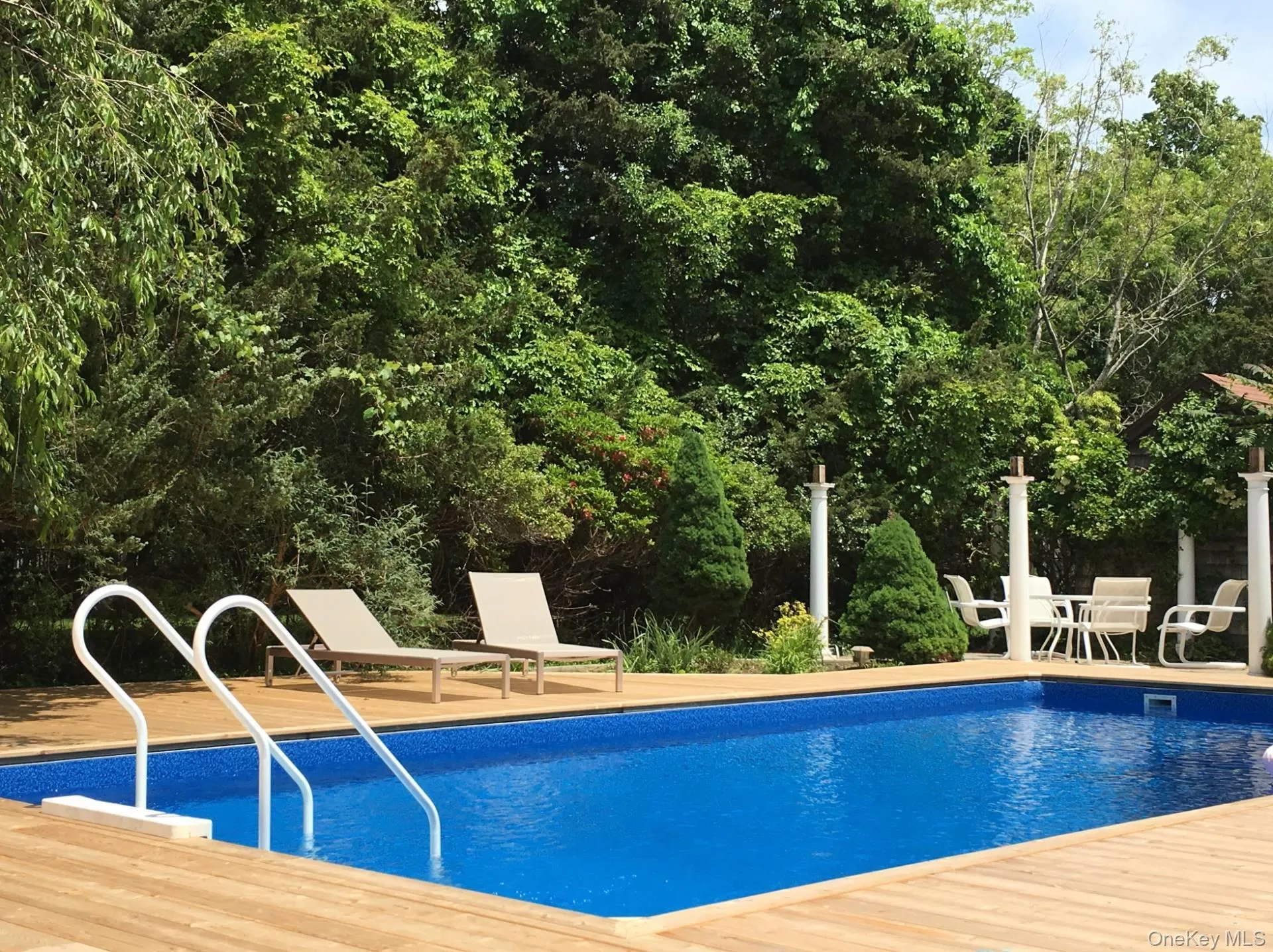 Outdoor pool featuring a patio Outdoor pool featuring a patio