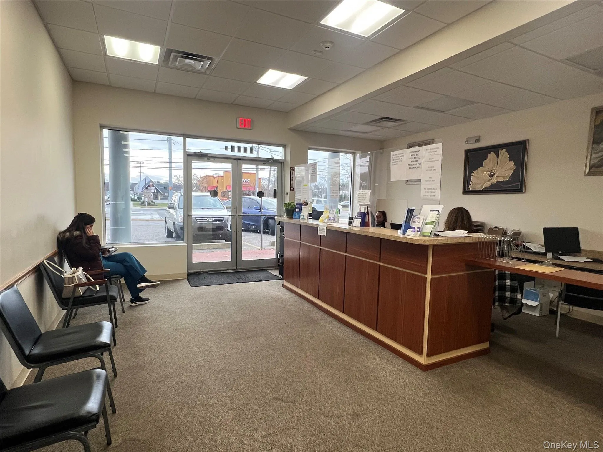 Reception with french doors and a paneled ceiling Reception with french doors and a paneled ceiling