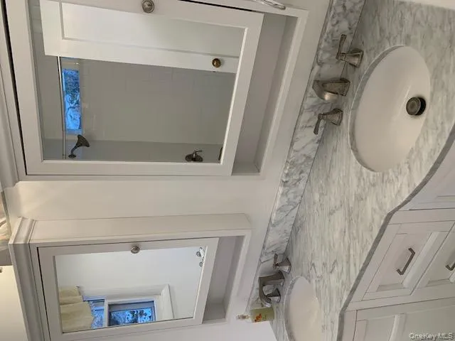 Full bathroom with double vanity Full bathroom with double vanity