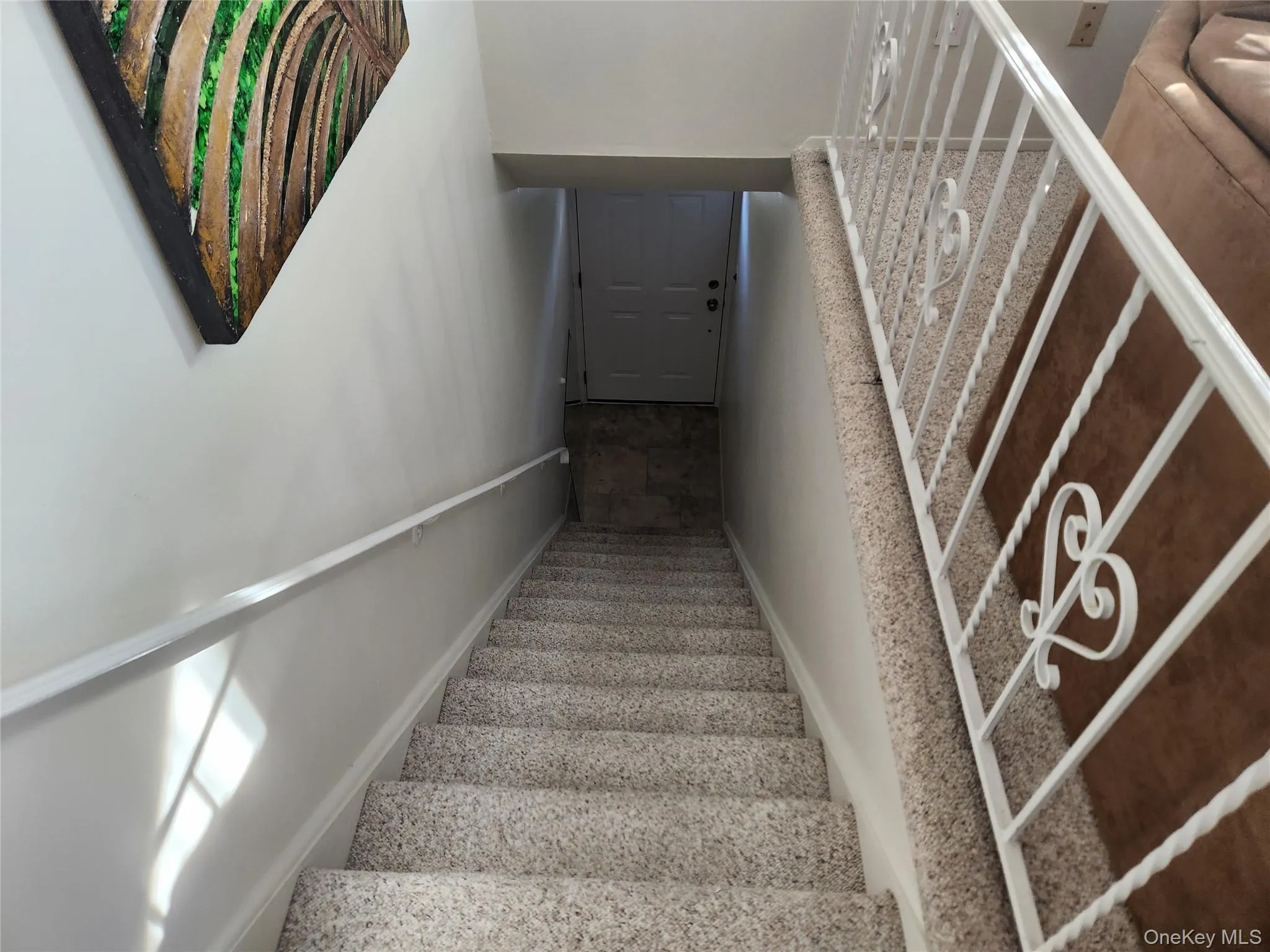 Stairs featuring baseboards Stairs featuring baseboards