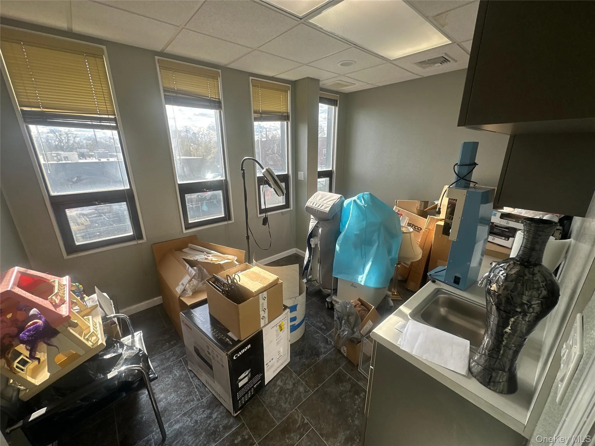 Misc room featuring a paneled ceiling Misc room featuring a paneled ceiling