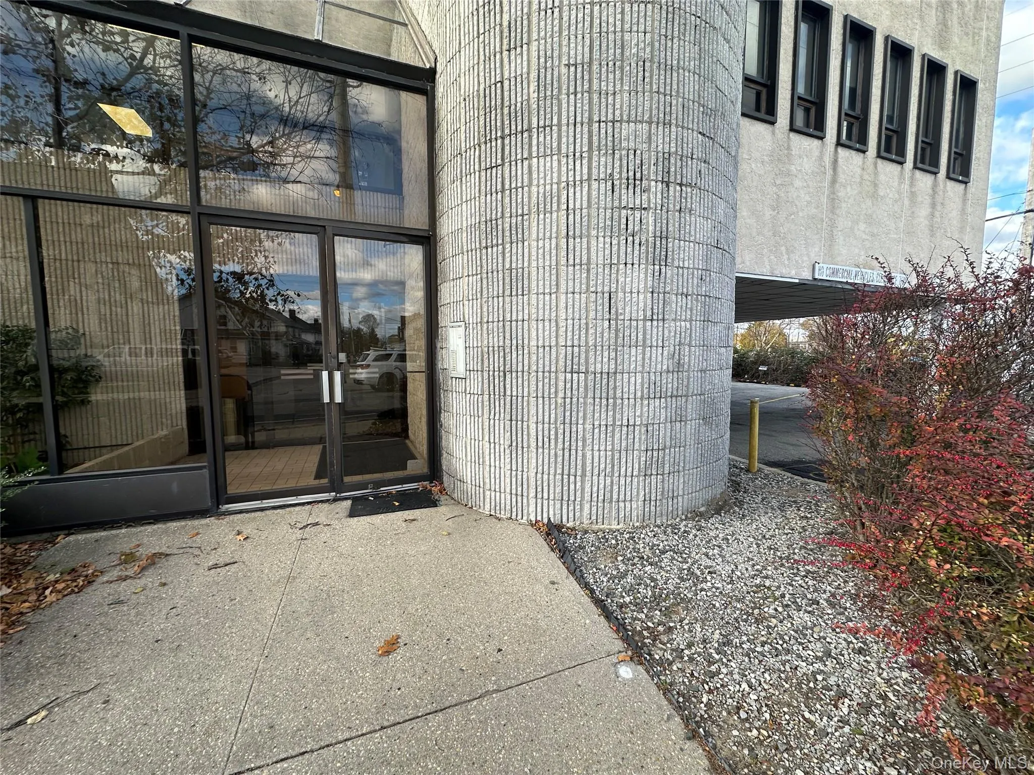 Doorway to property featuring stucco siding Doorway to property featuring stucco siding