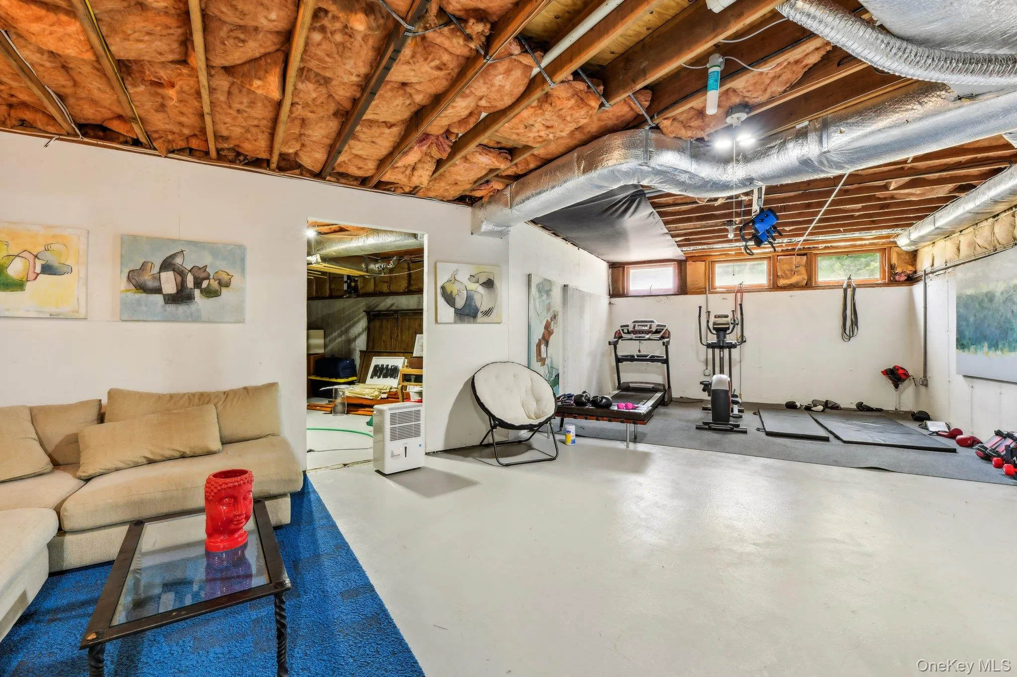 Workout area with concrete flooring Workout area with concrete flooring