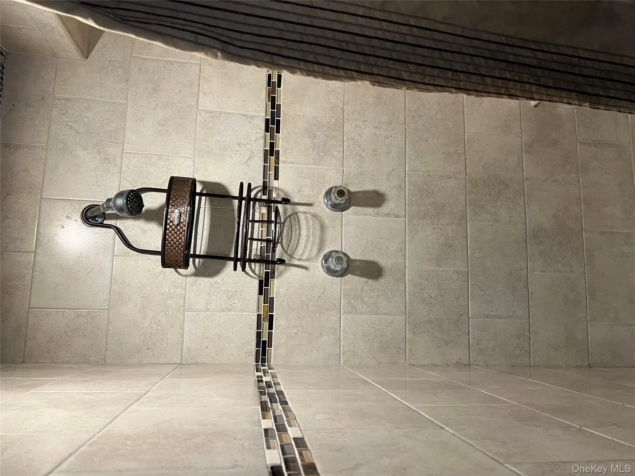 Bathroom view of a tile shower Bathroom view of a tile shower