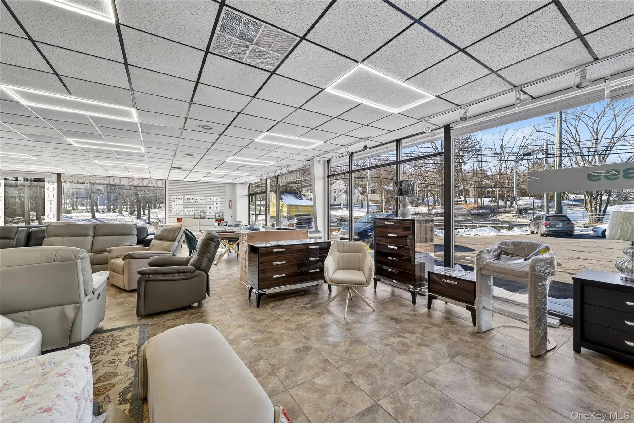 Common area with a drop ceiling Common area with a drop ceiling