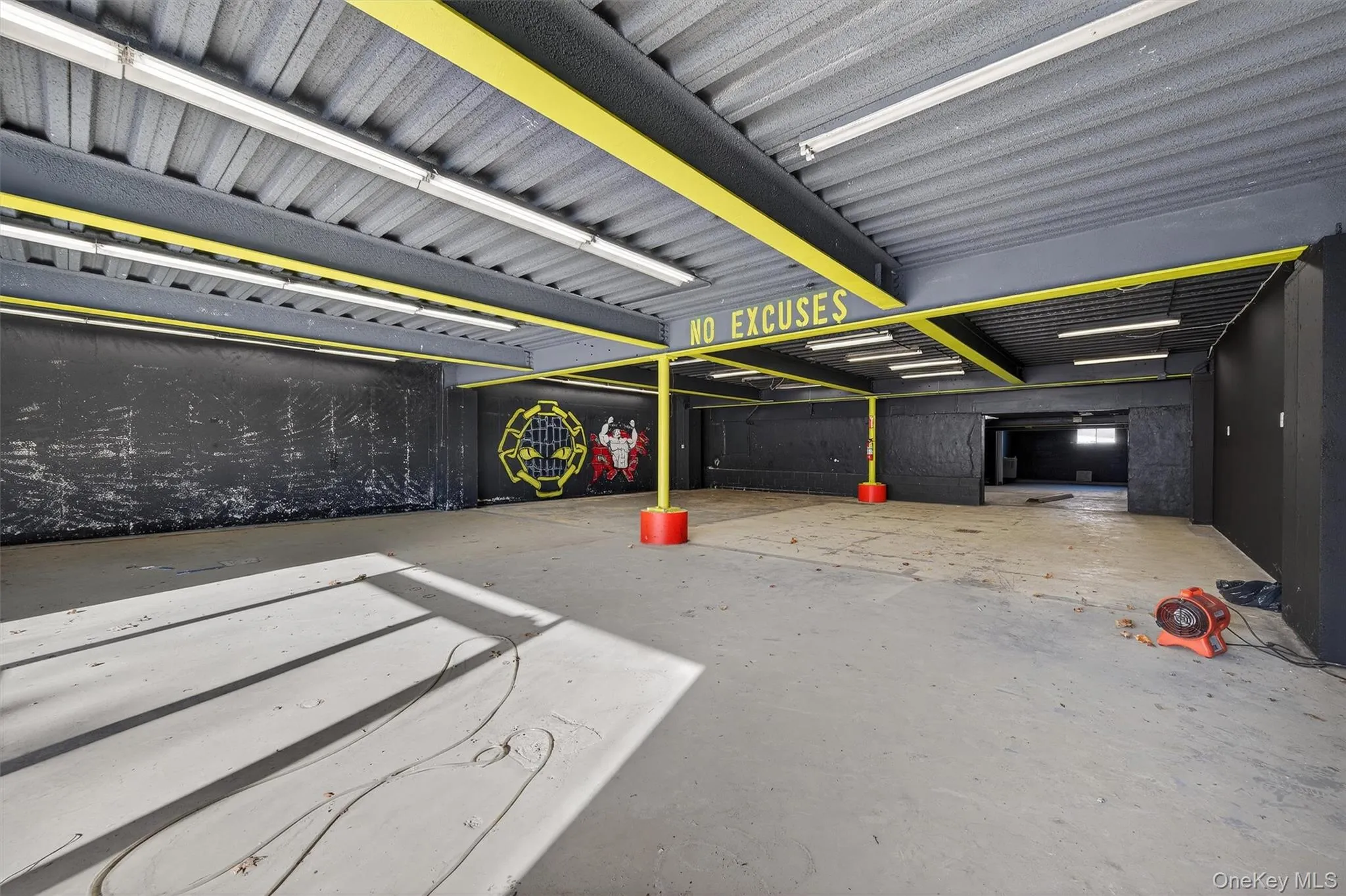 Misc room featuring concrete flooring Misc room featuring concrete flooring